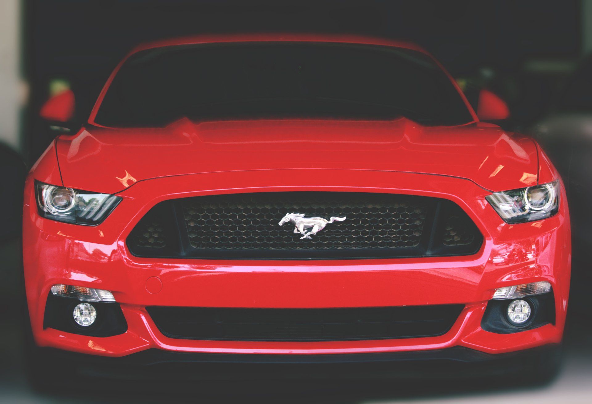 Picture of the front of a Ford Mustang.
