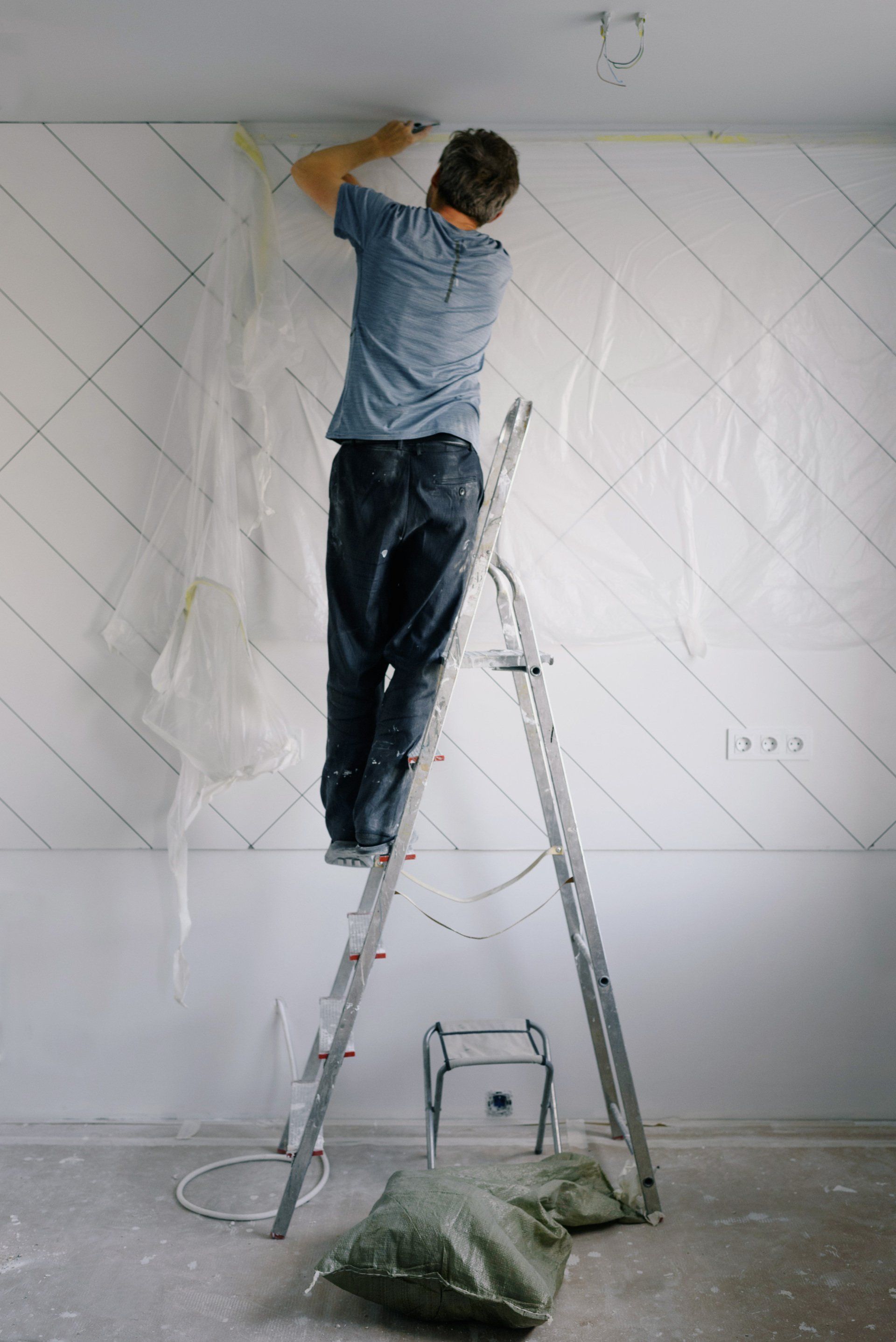 a man working on a wall