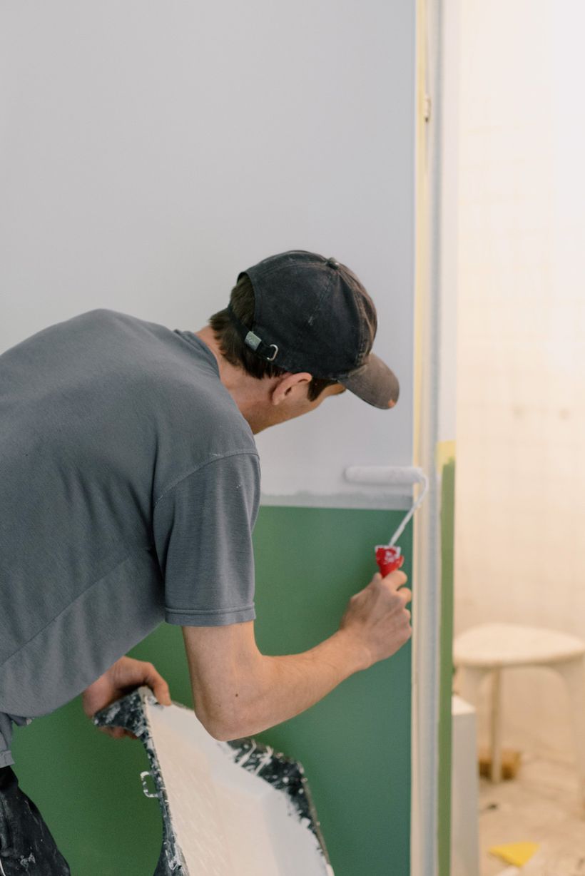 guy painting wall