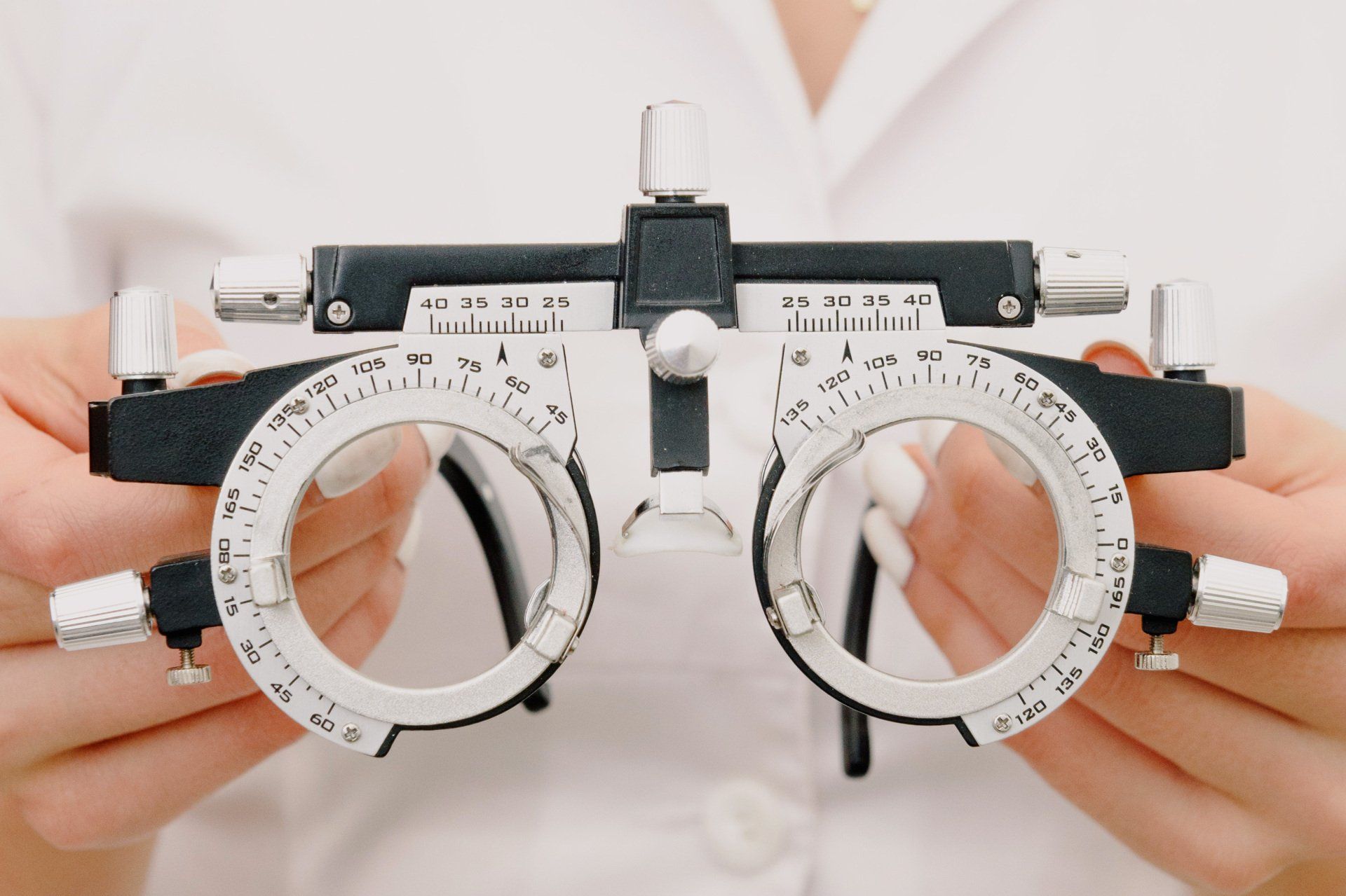 Optometrist using tool