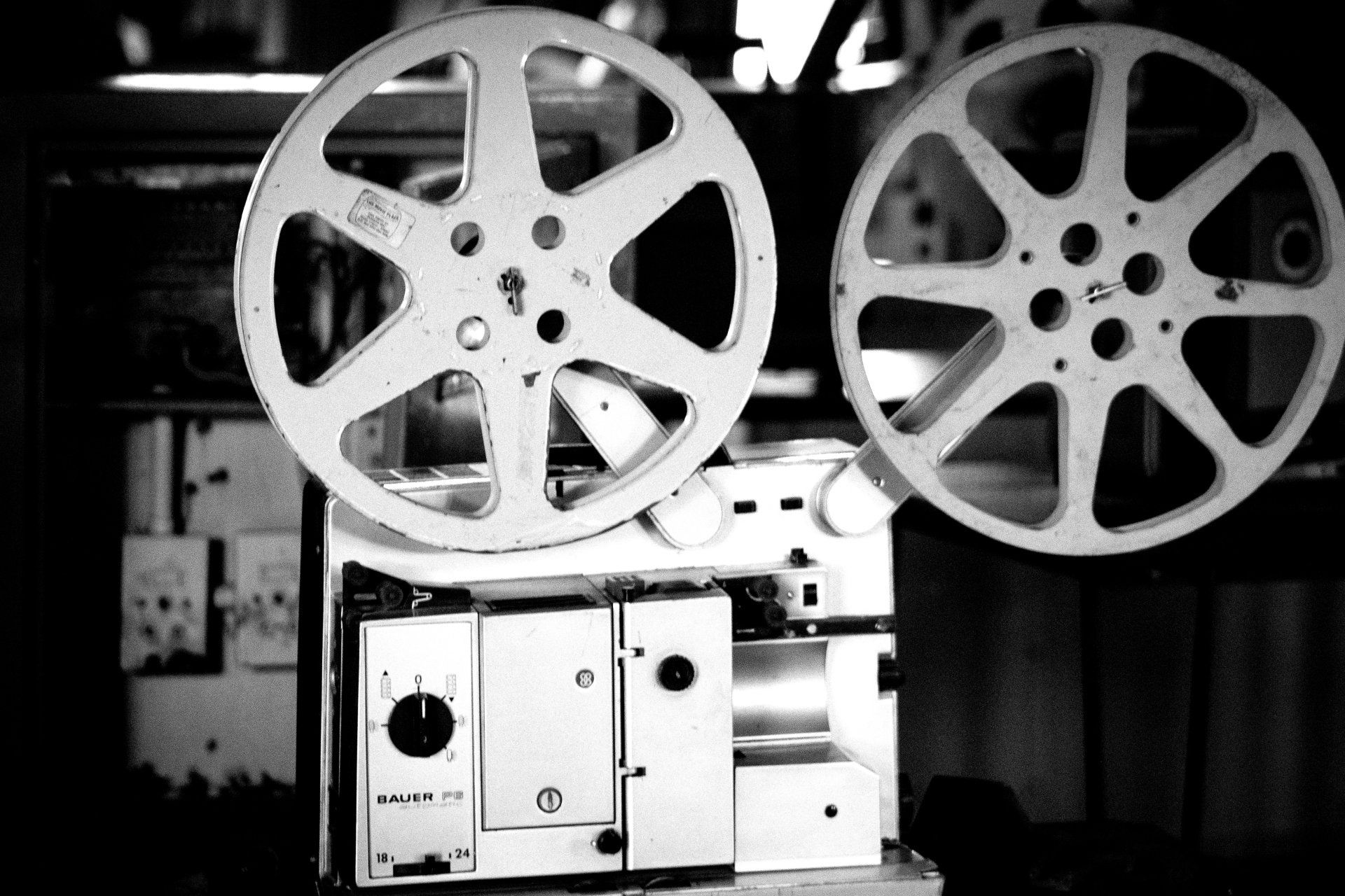 a black and white photo of a bauer ps movie projector