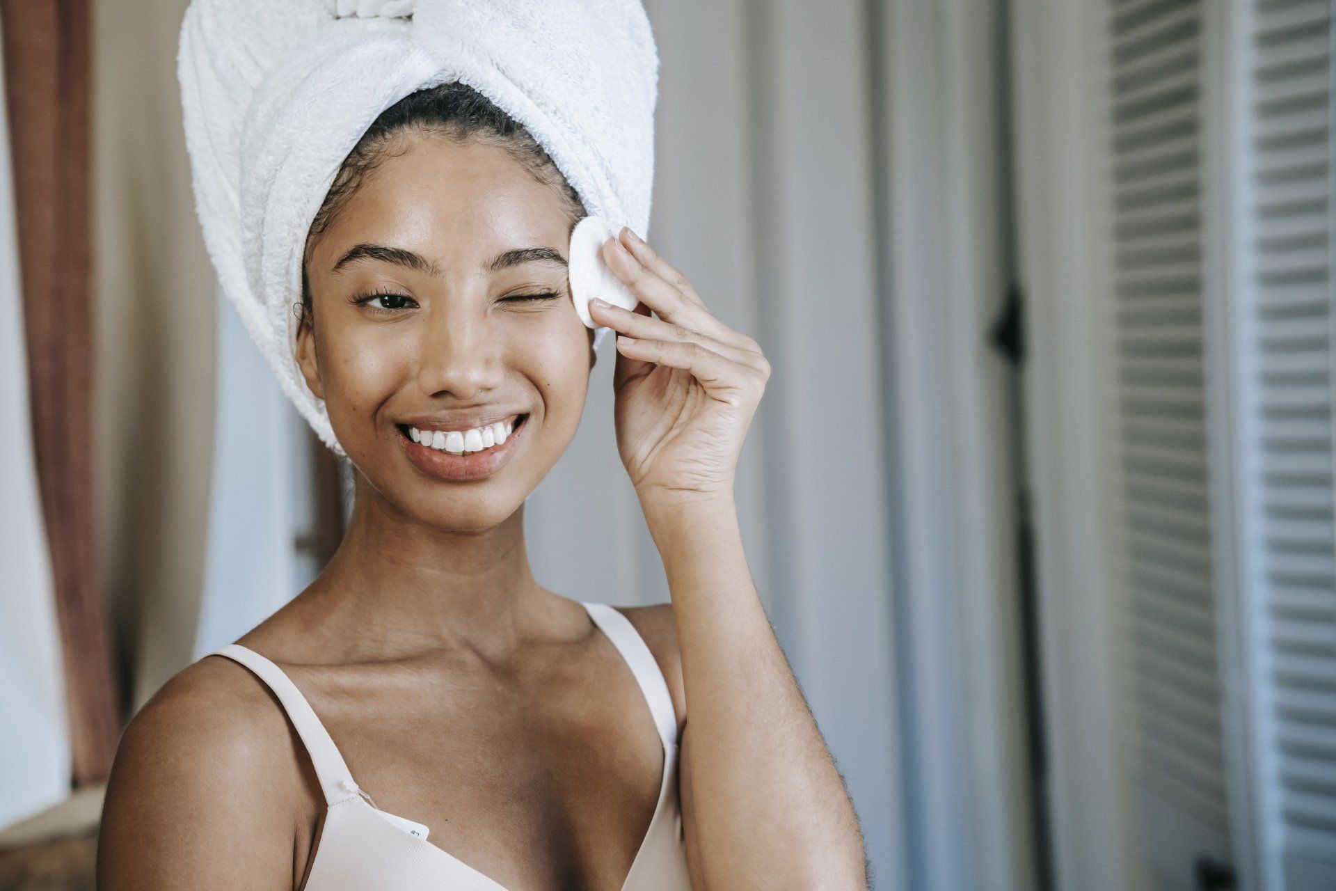 Woman Smiling With Towel in Hair | Gum Disease Dentist in Weston FL 33326