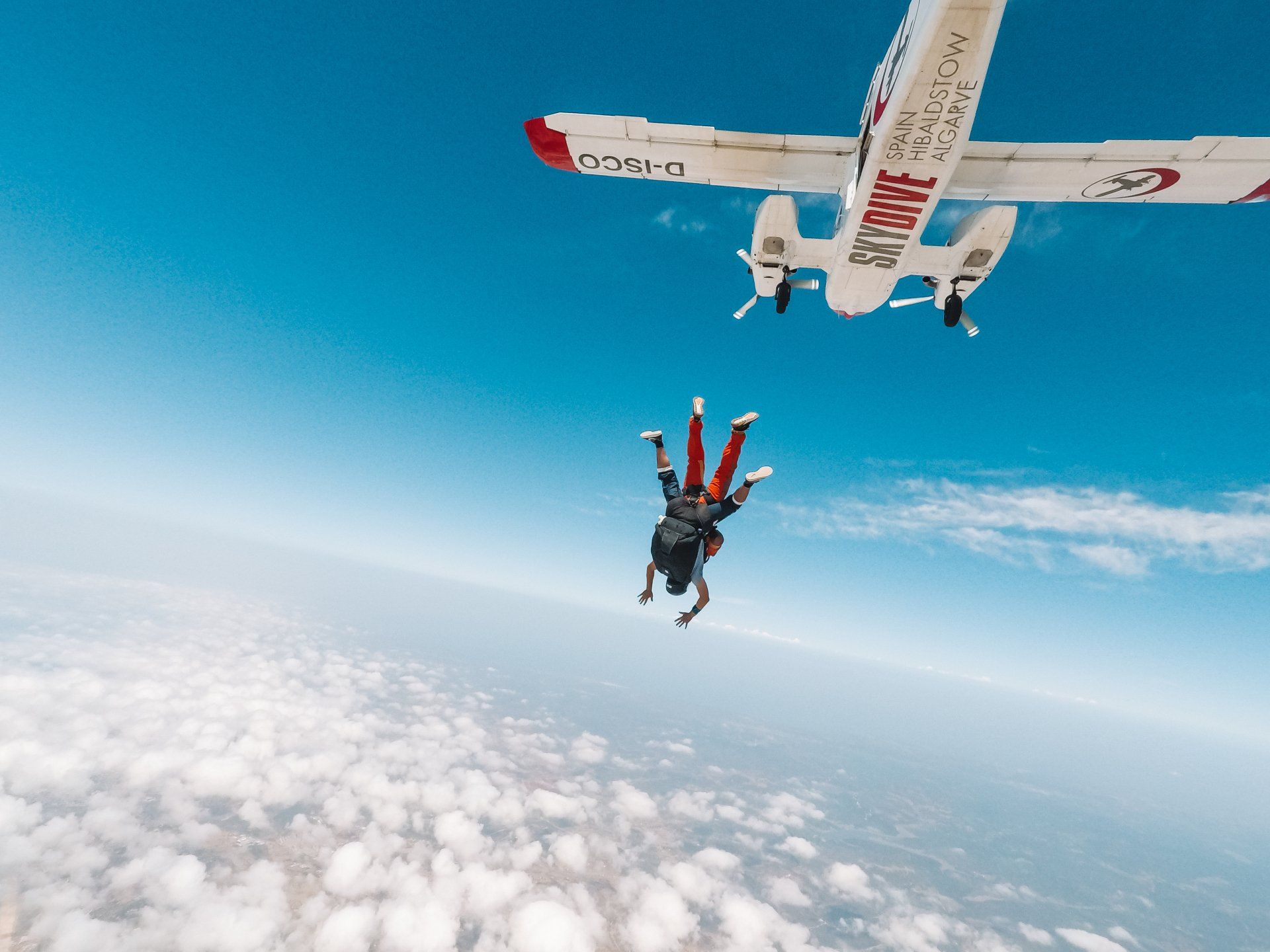 A Trust Experiment in action with people skydiving from a plane
