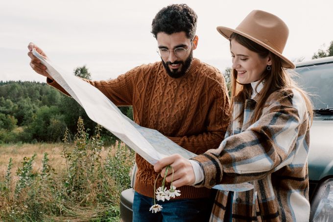 A marketing agent using a tablet to look at local map listings.