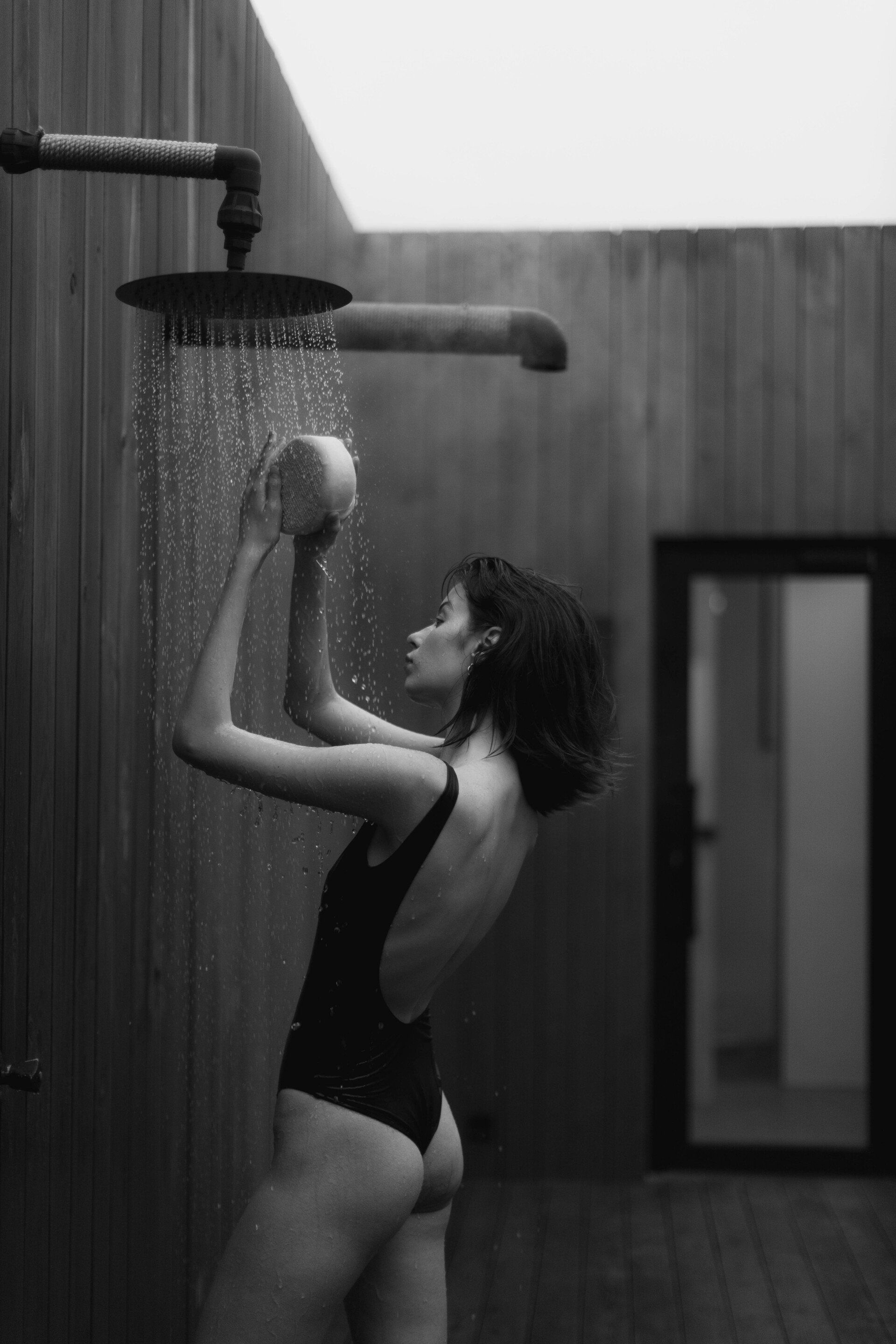 a woman taking a shower