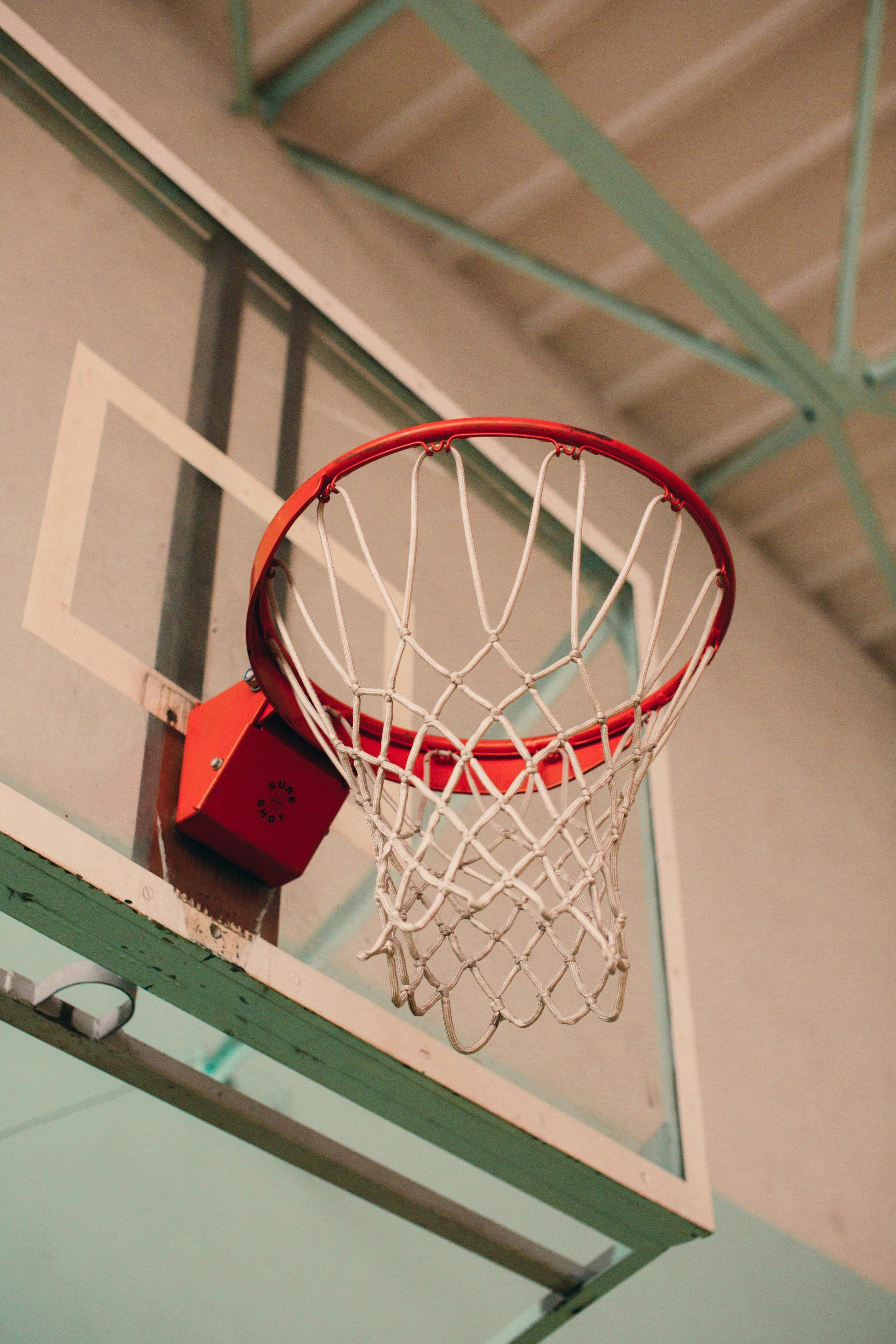 A close up of a basketball hoop in a gym