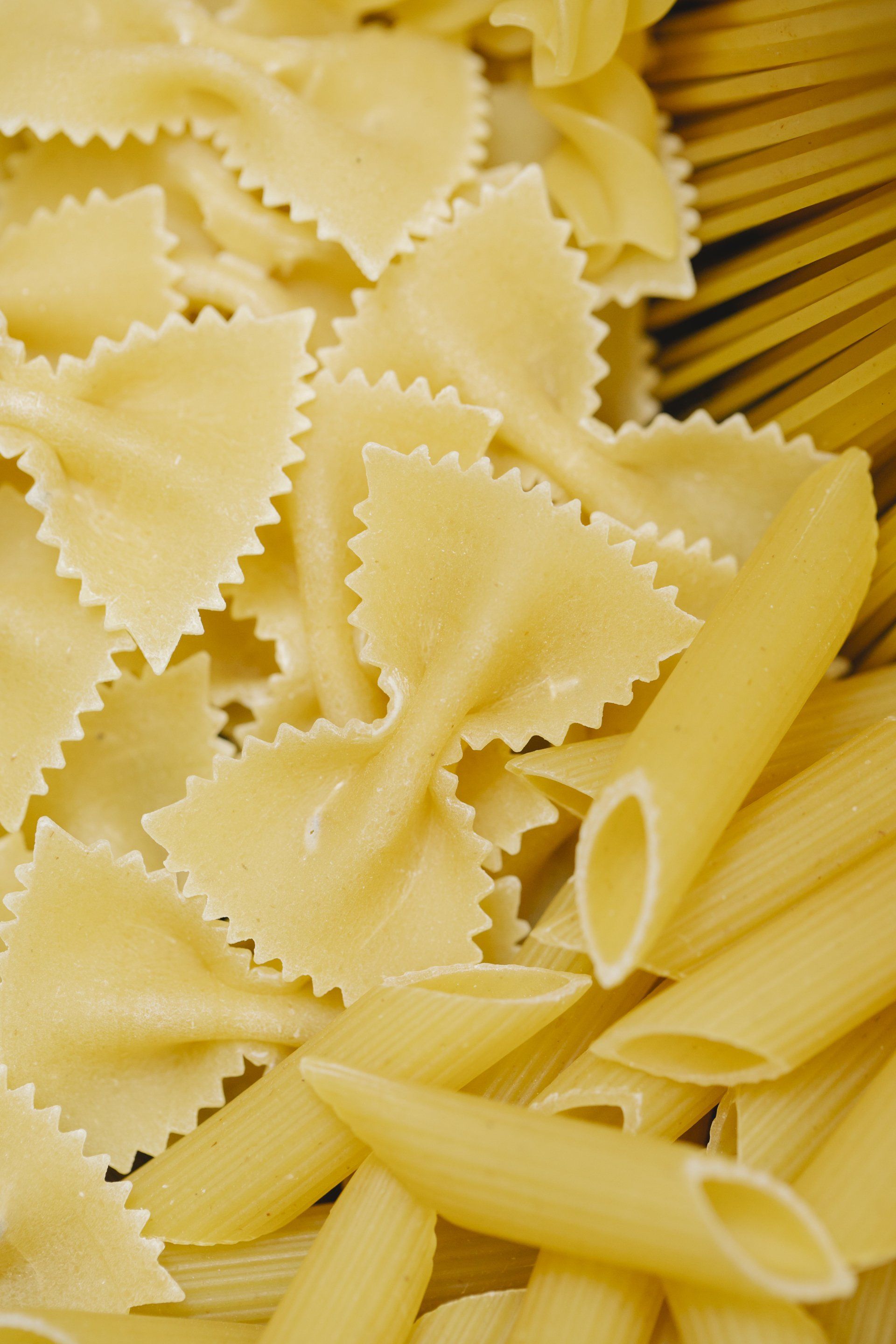 There are many different types of pasta in this picture.