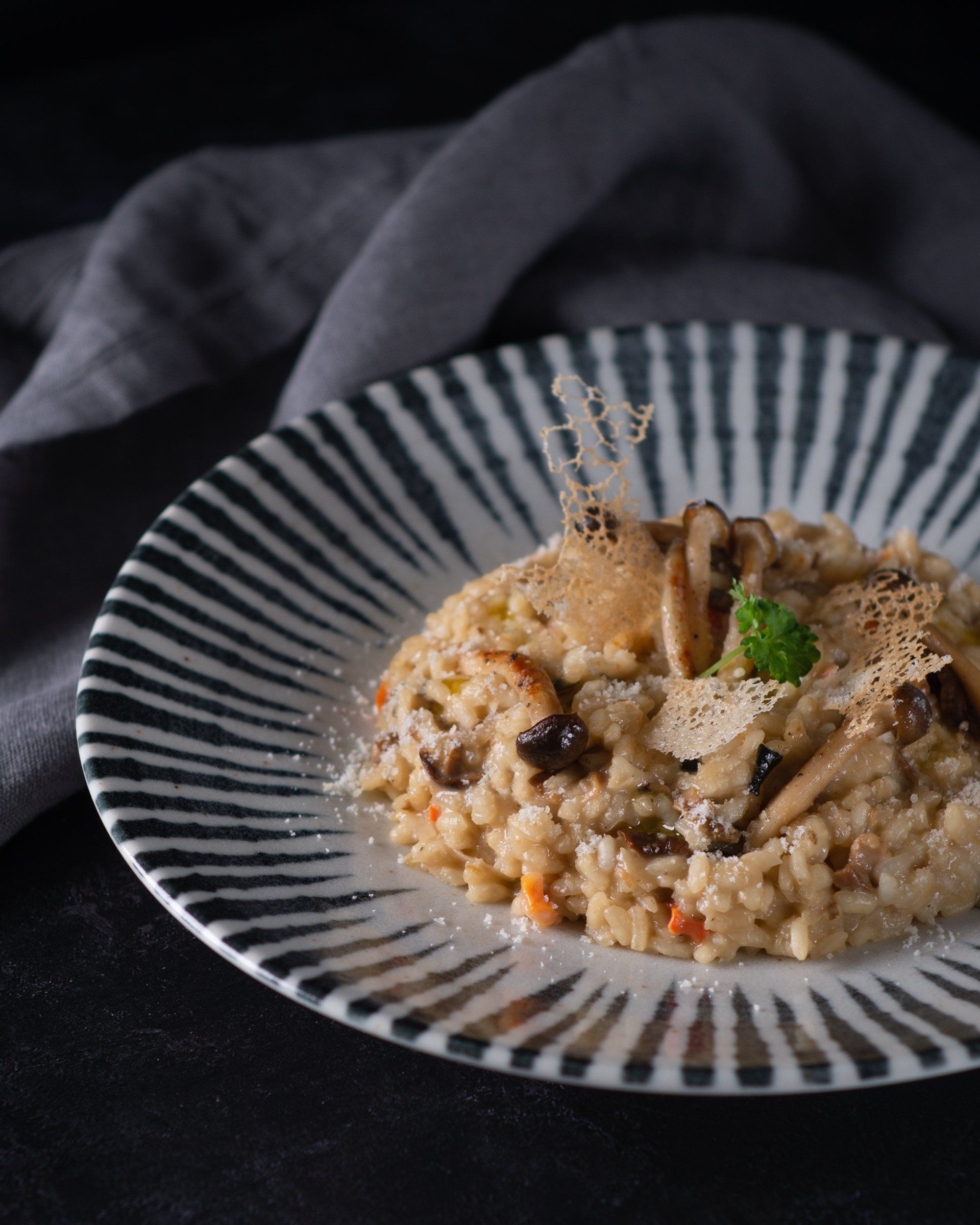 mushroom risotto on a plate on a table