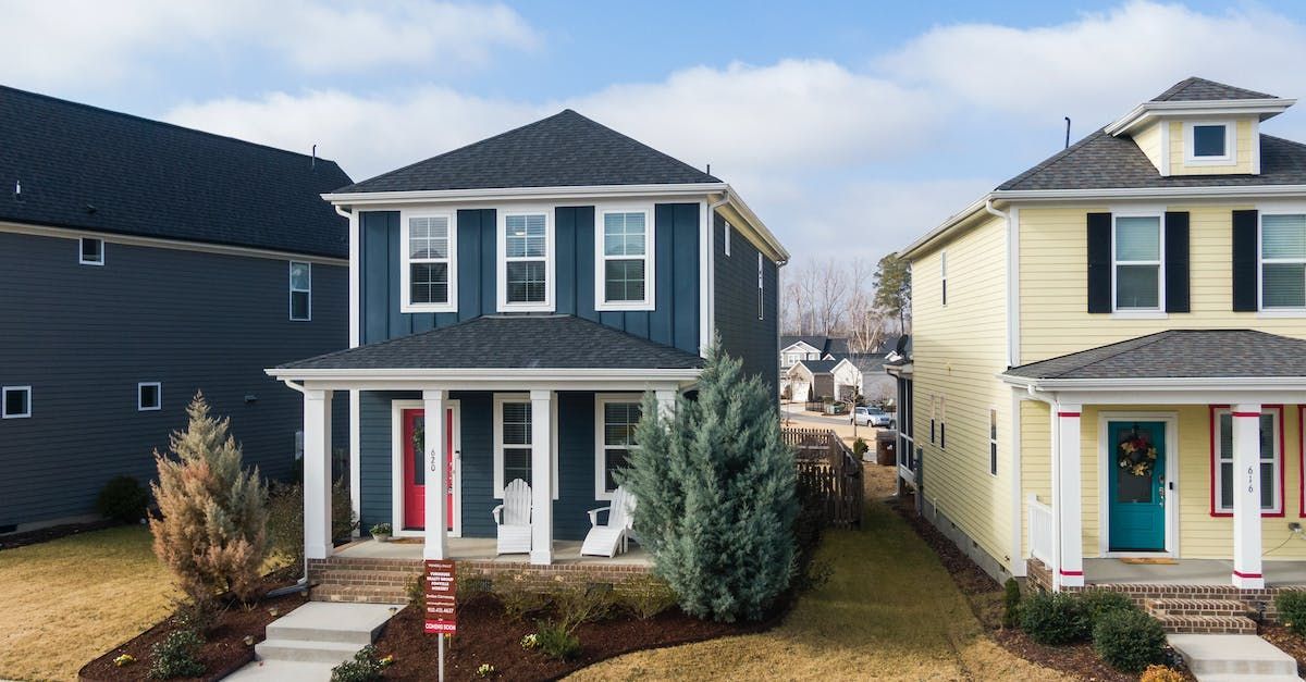 A row of typical older midwest city houses.