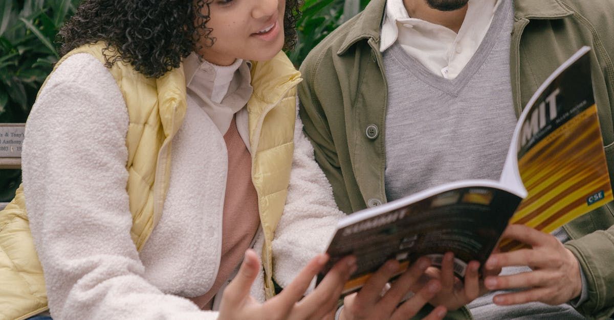 People reading a book together