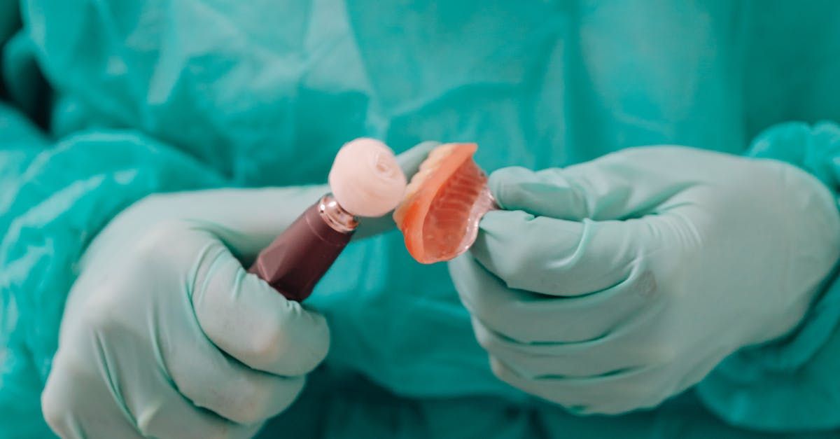 Doctor meticulously repairing a denture