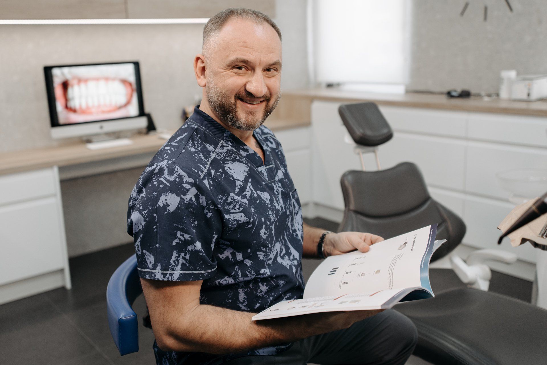 dentist smiling in the office