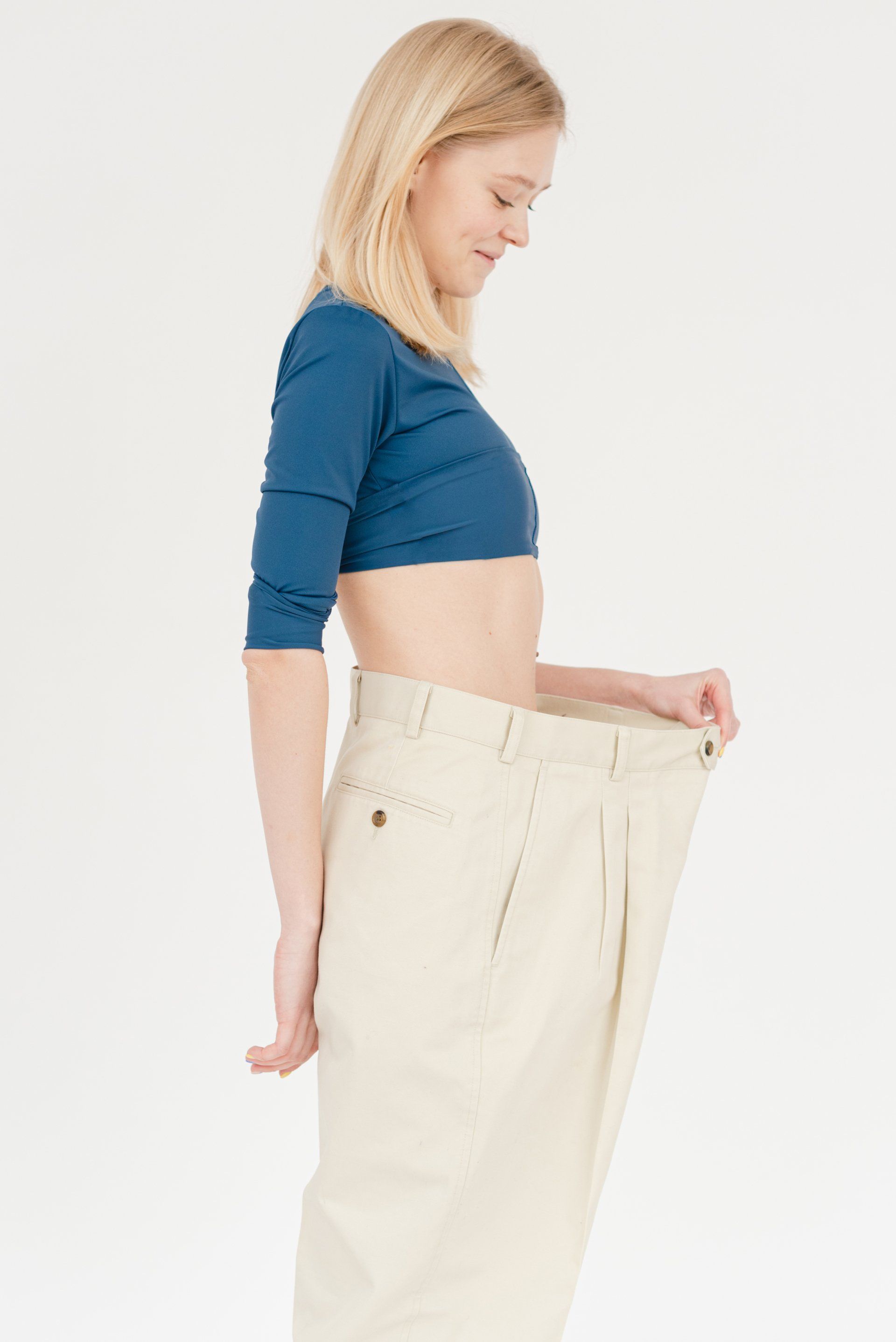 Fit woman wearing an extra large trouser
