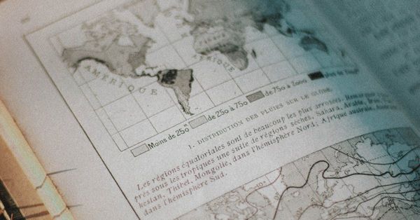 A book showing a map of the continents
