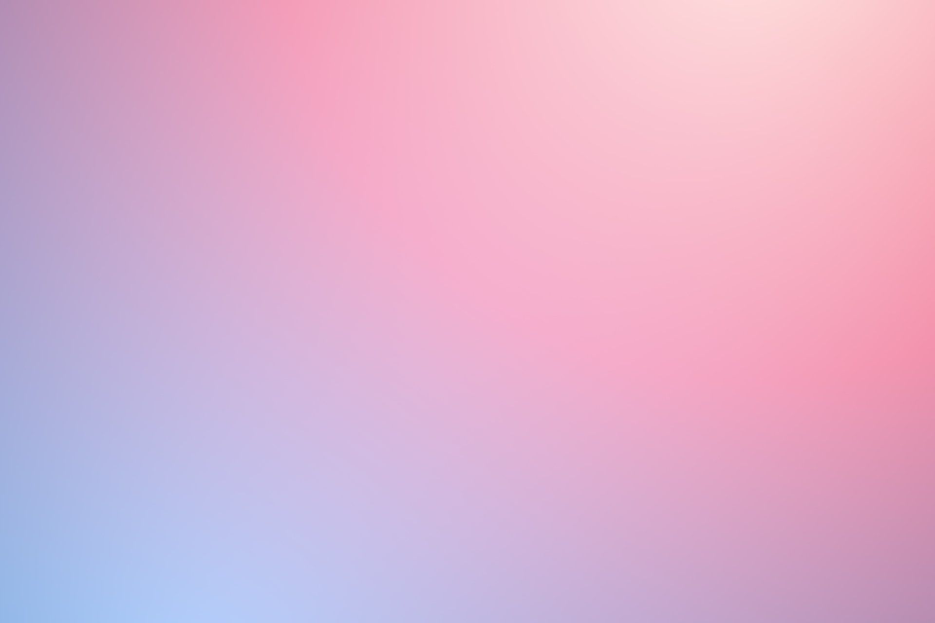 A pink and blue gradient background with a blurred effect