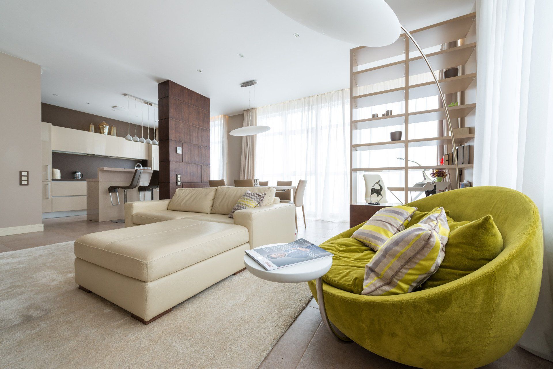 a living room with clean sofas & carpet