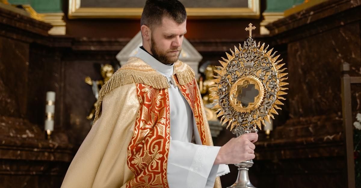 Priest carrying a monstrance.