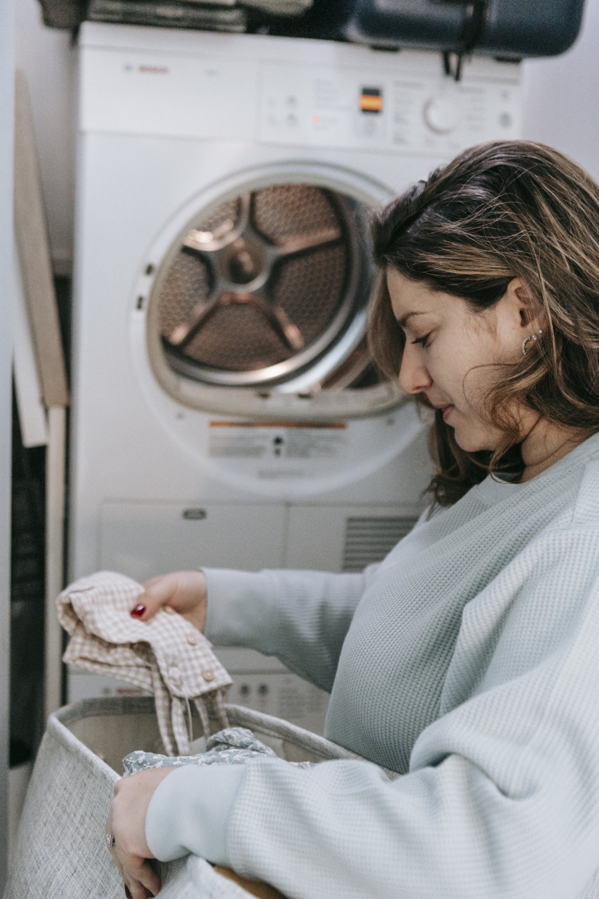 a woman doing her laundry