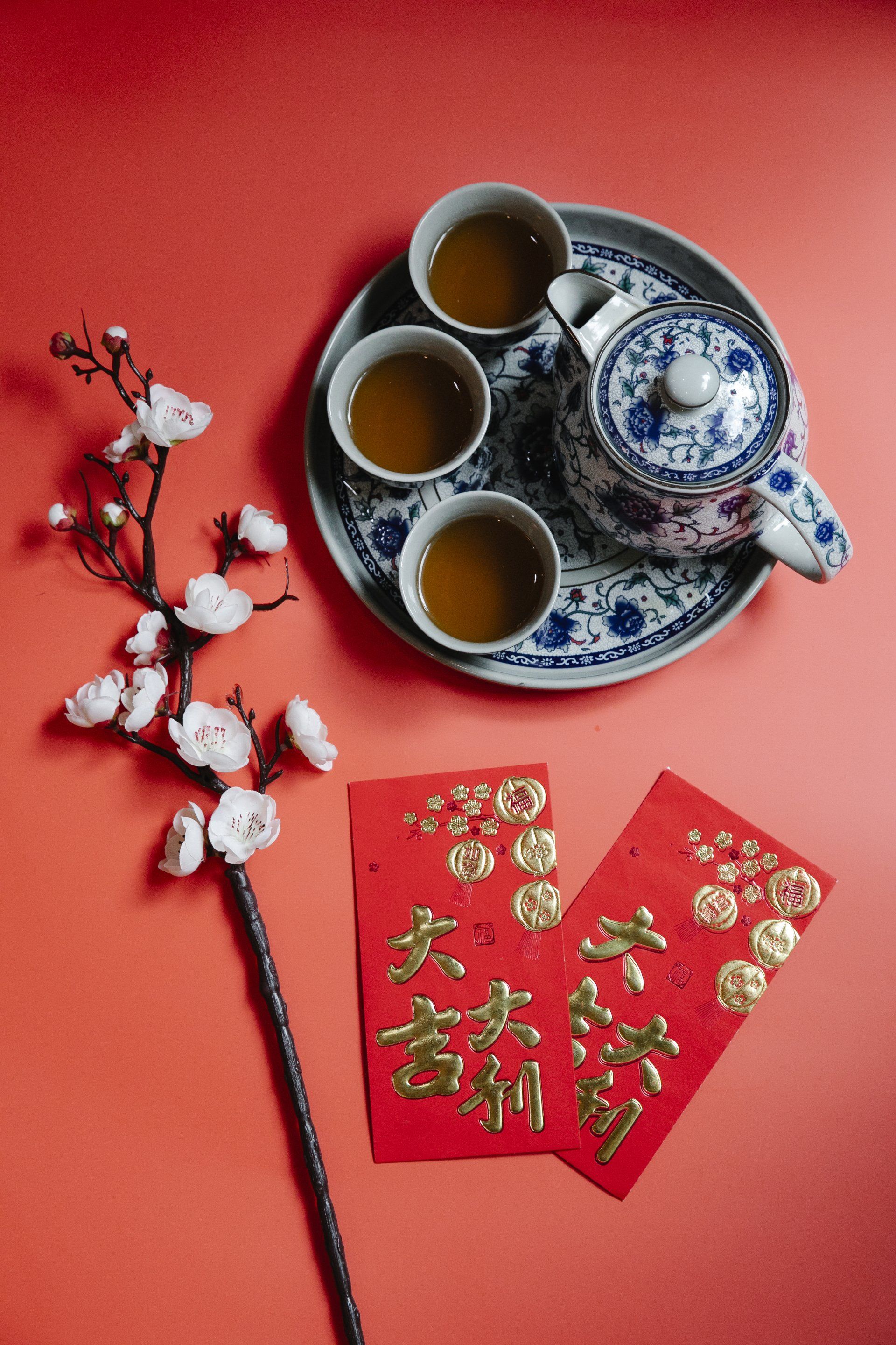 Elegant arrangement of a tea set with various tea blends, showcasing the artisanal quality of Mythic Isles' products