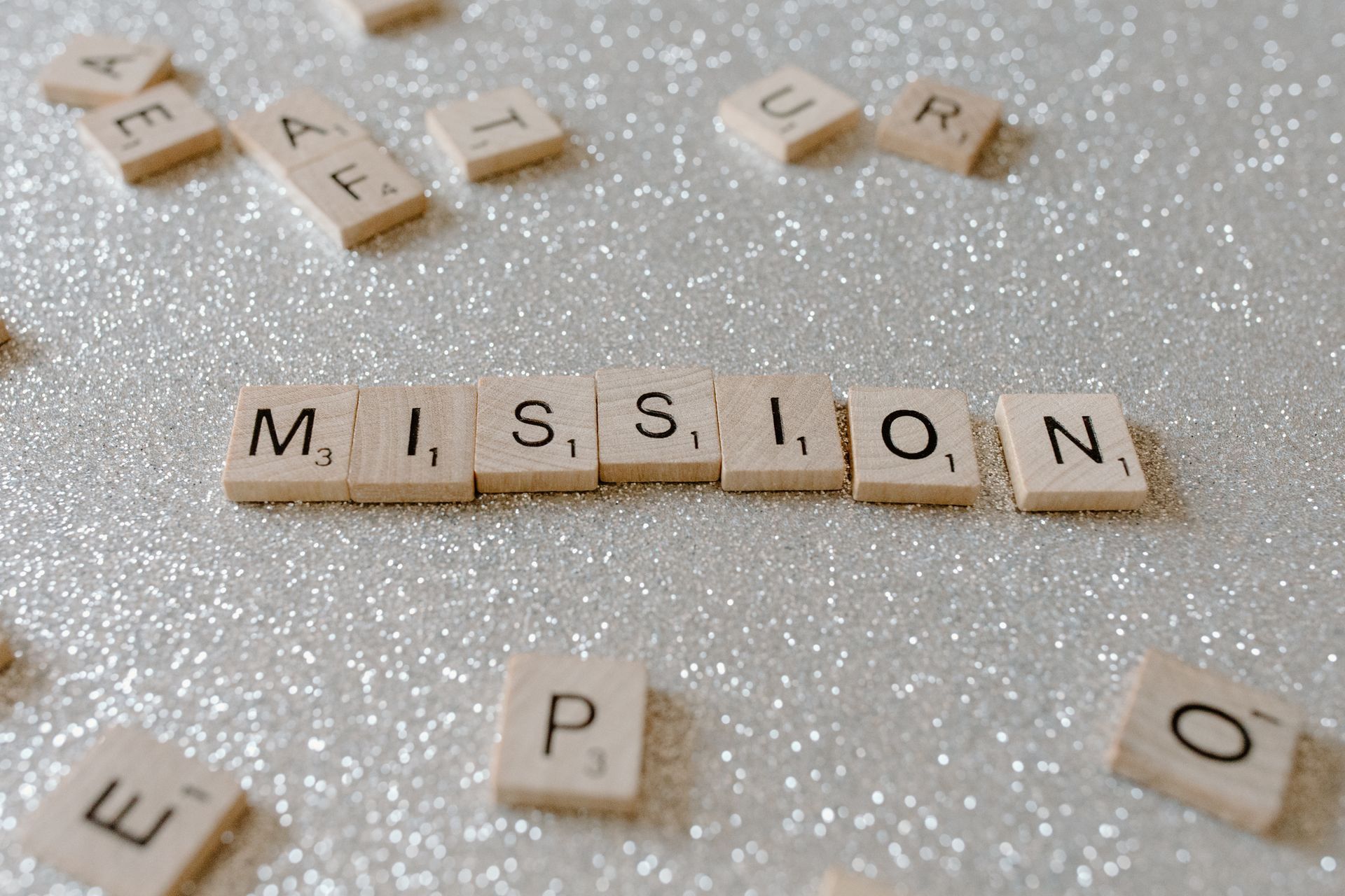 The word mission in Scrabble pieces