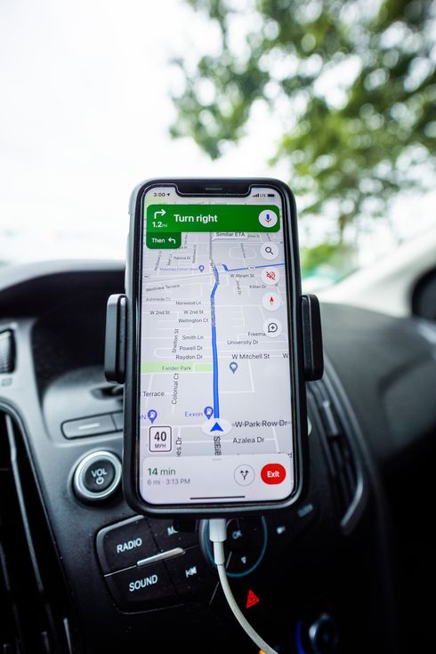 a close up of a car dashboard with a map on it .