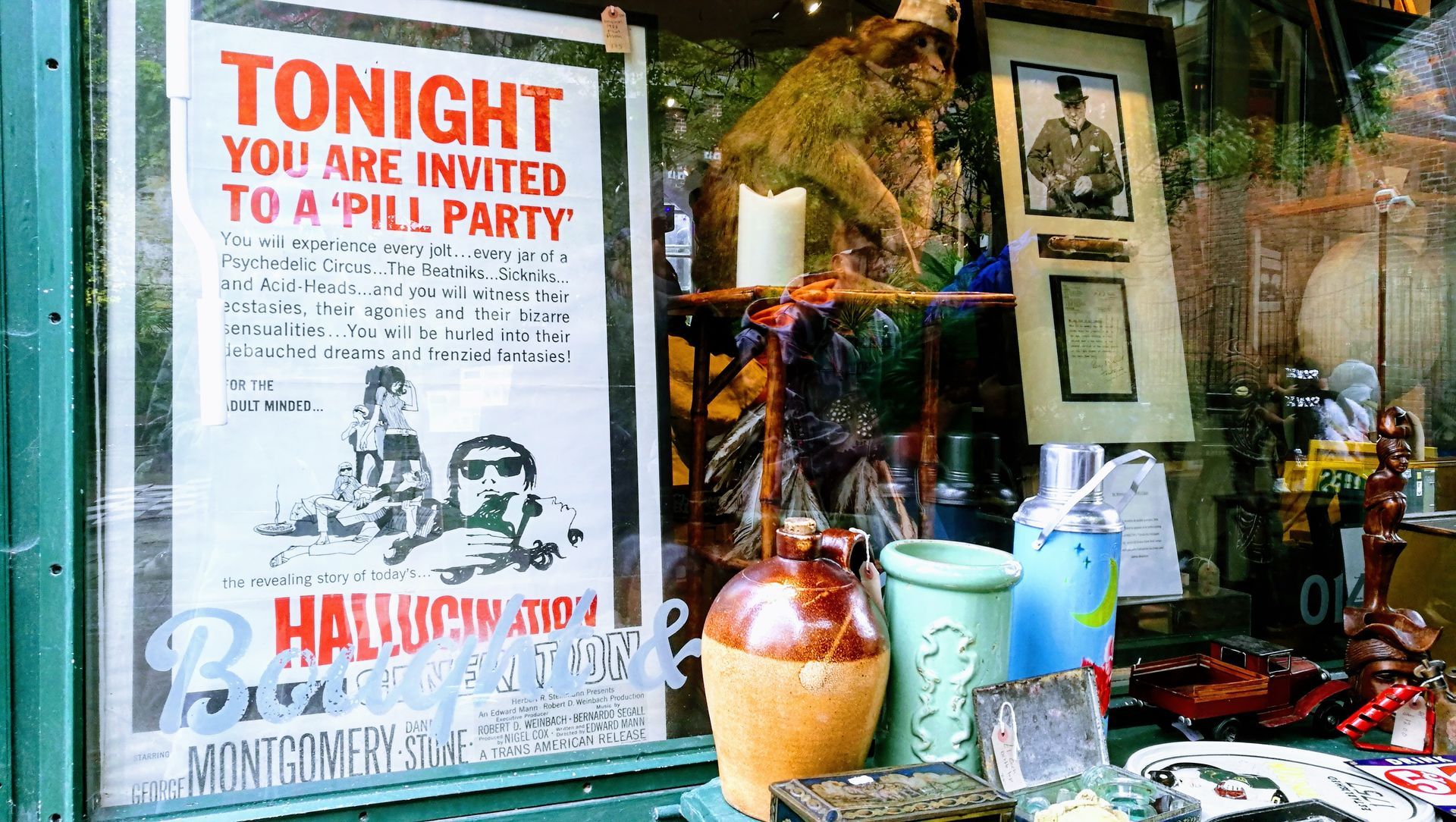 a poster in a window that says tonight you are invited to a pill party