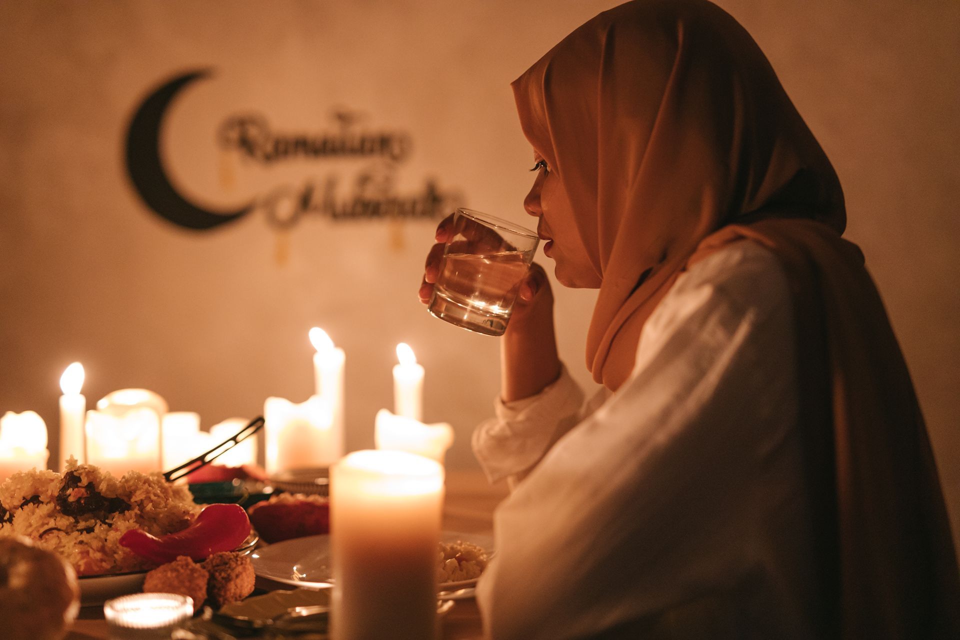 woman ramadan drink water