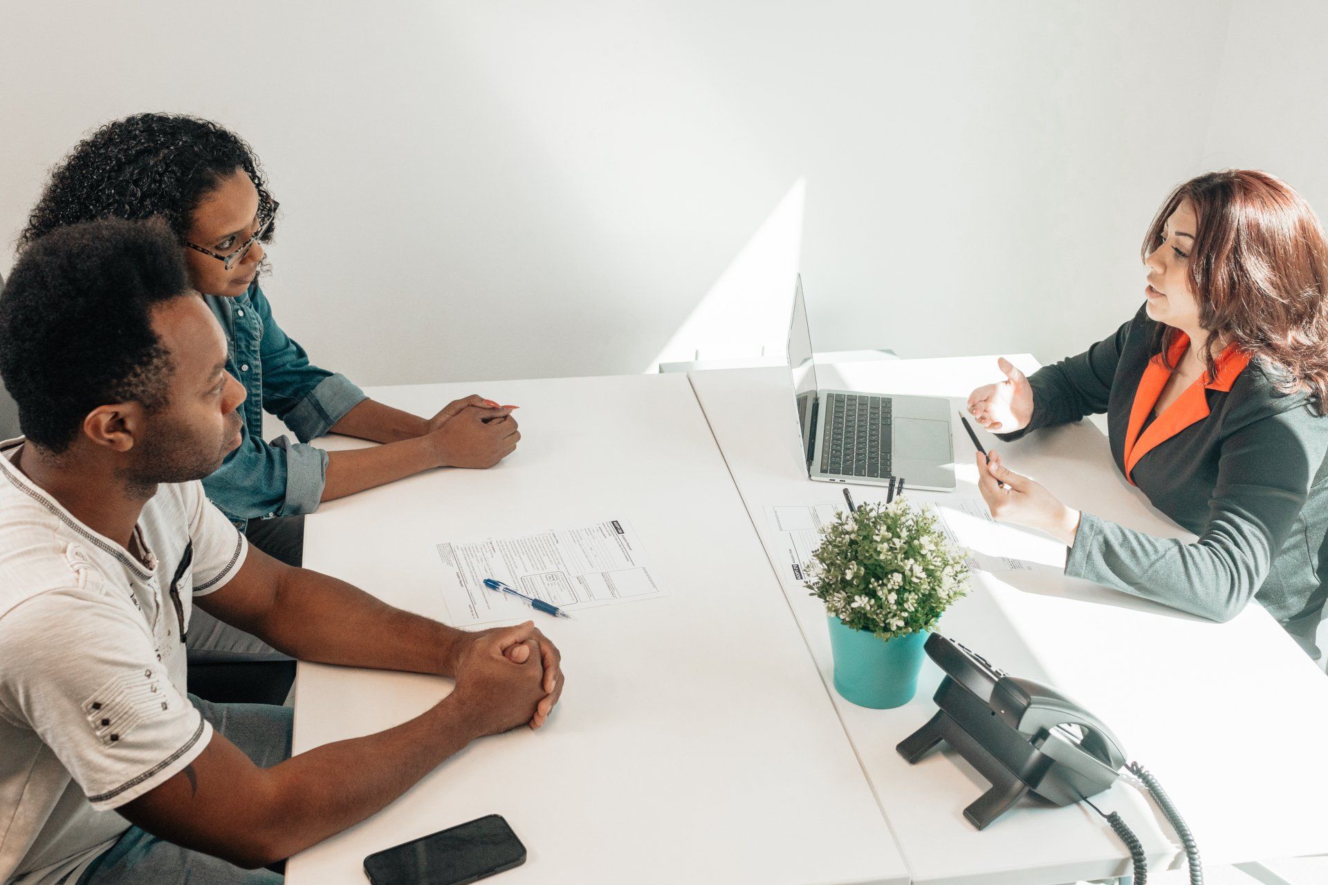 A couple talking to a consultant