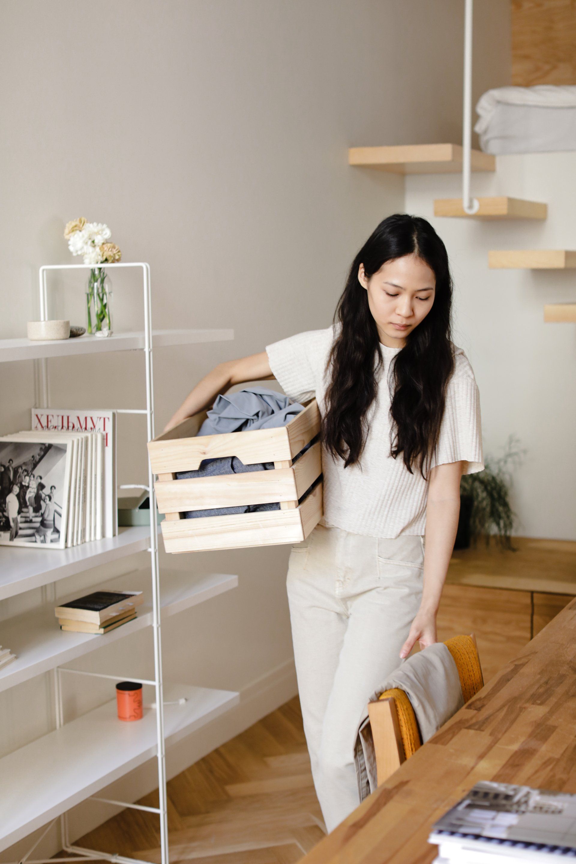 a woman organizing clothes