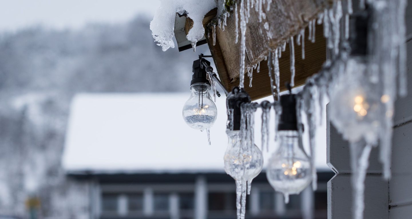 Icicles dripping off of Christmas lights