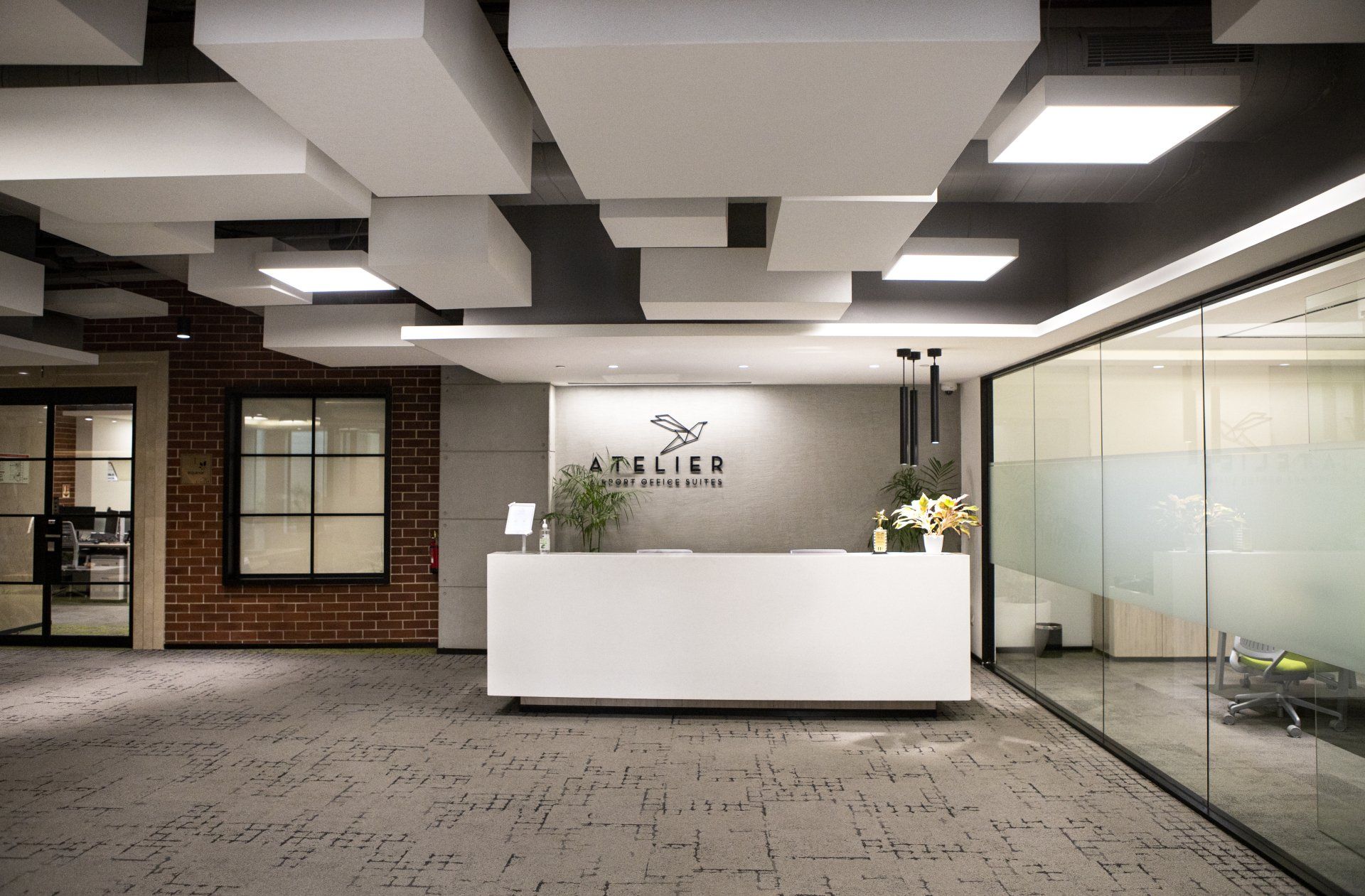 a carpet covering the office floor