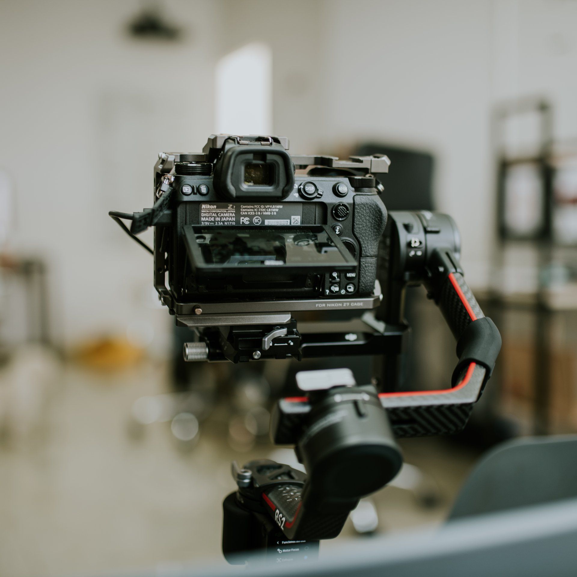Gimbal Camera for Videography Services: An image displaying a gimbal-mounted camera used for professional videography services. The camera is stabilized by the gimbal, allowing smooth and steady footage capture. 