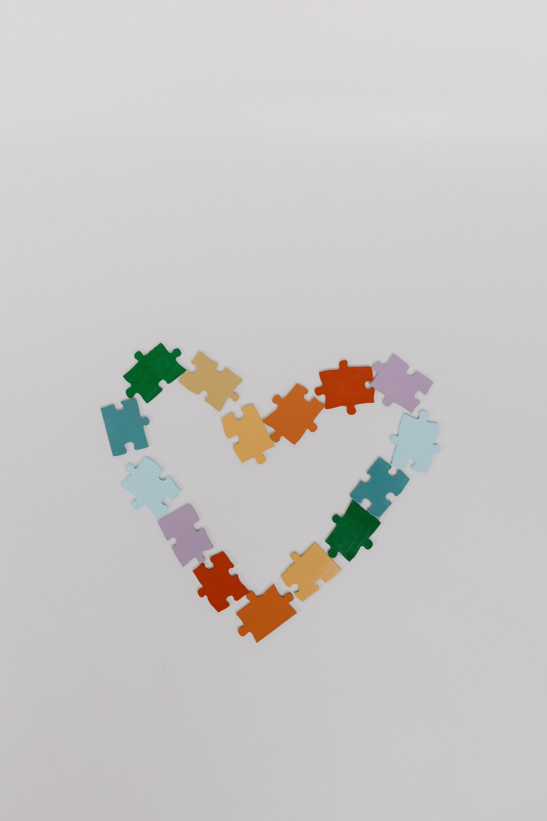 Services gallery; image of a puzzle pieces shaped into a heart