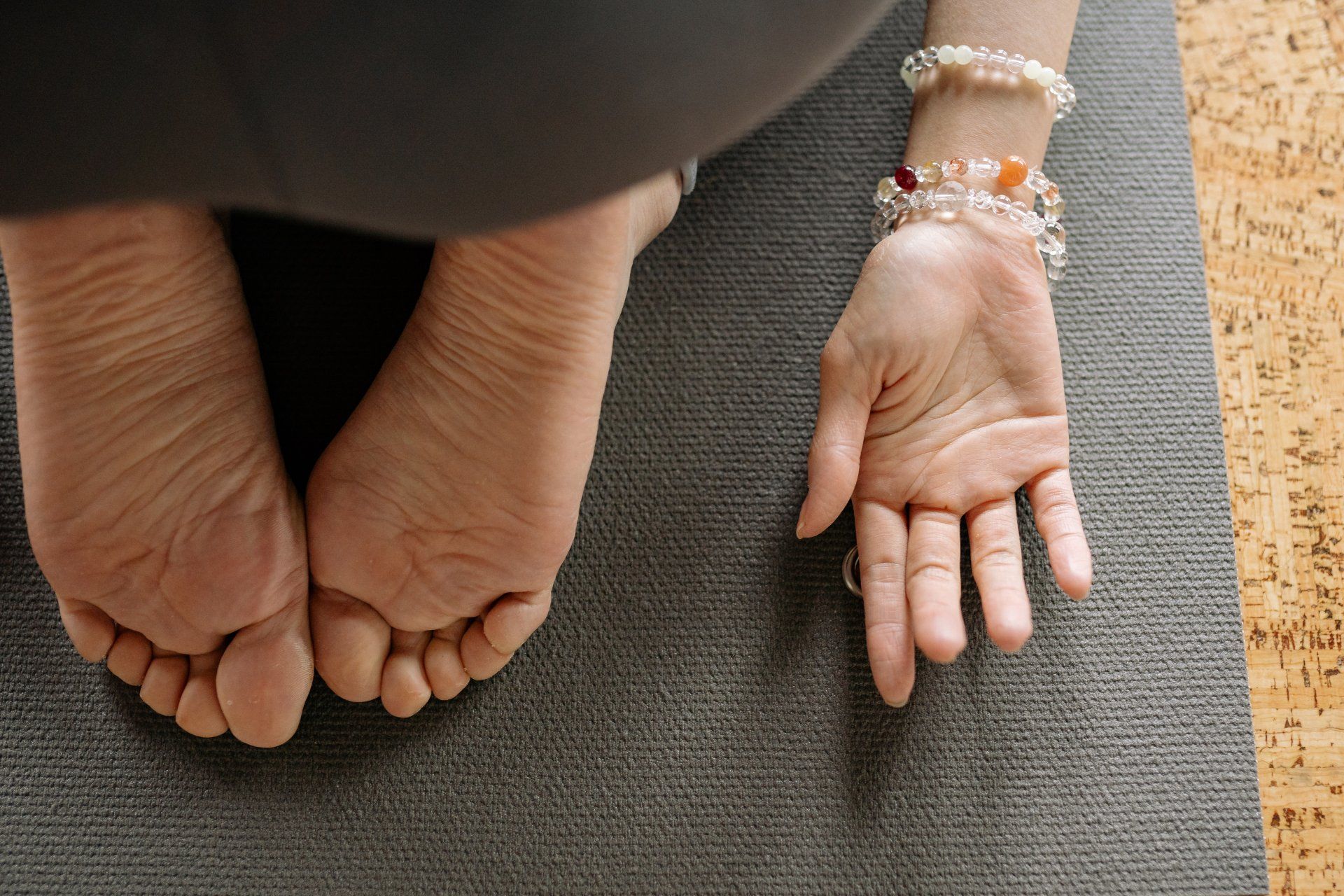 hands and feet in childs pose 