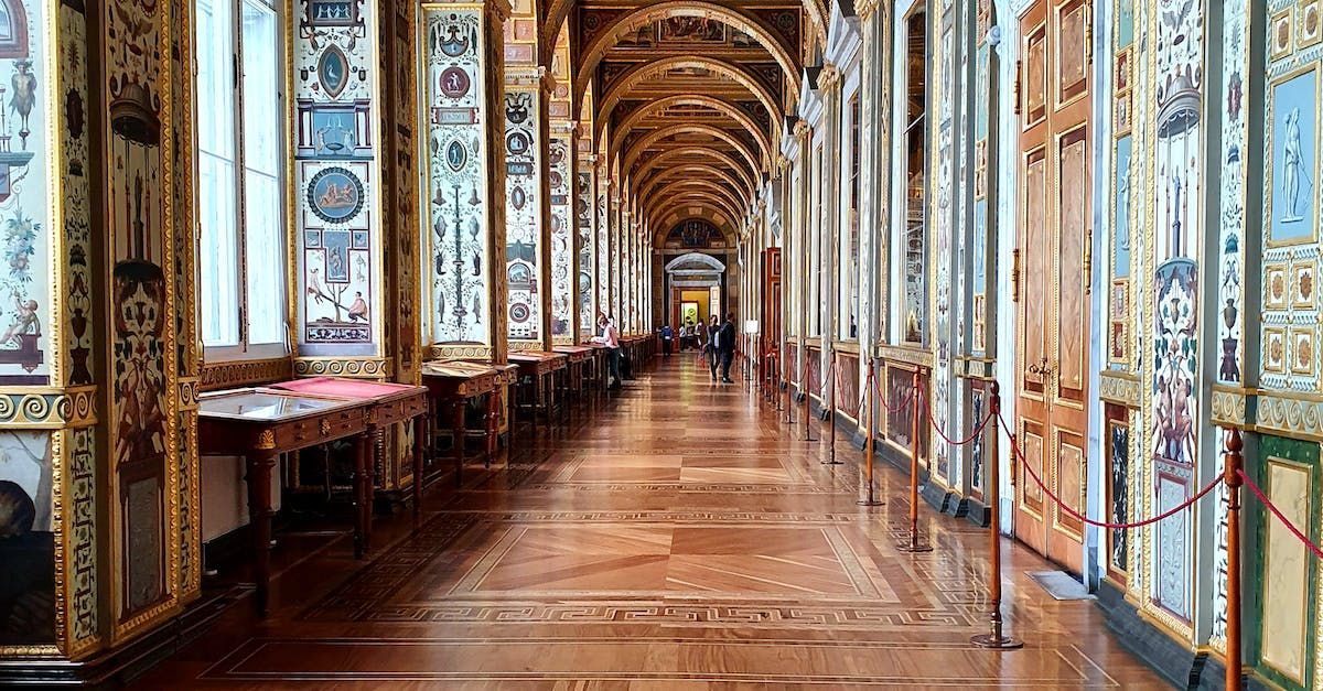 Corridor in St. Petersburg's State Hermitage with intricate and ornamental wood flooring in multiple patterns.