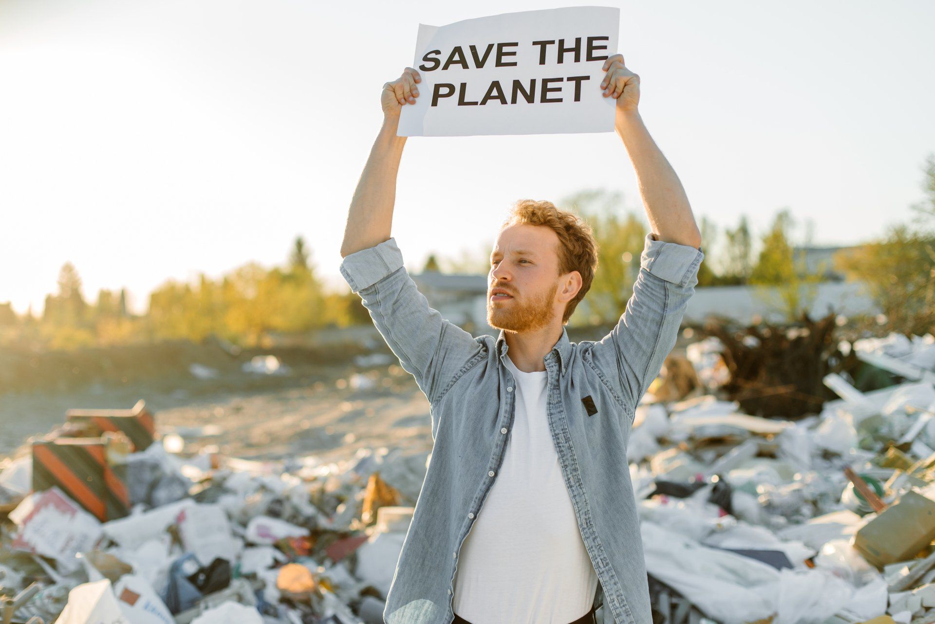 Guy Holding Save The Planet