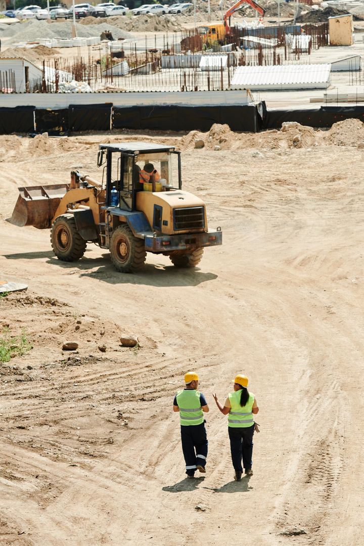 Front Loader and People Learning — Des’s Driving School in Calla Bay, NSW