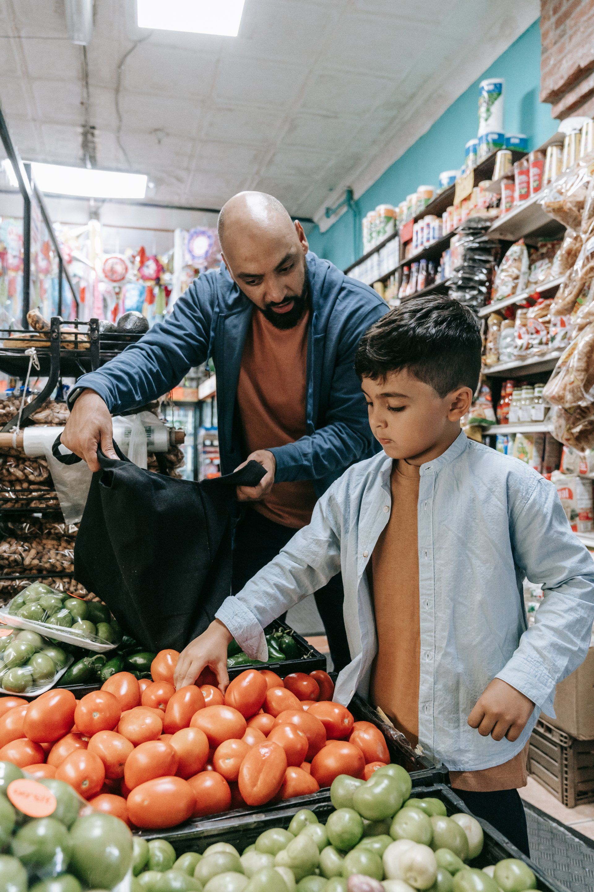 Dad and son grocery shopping