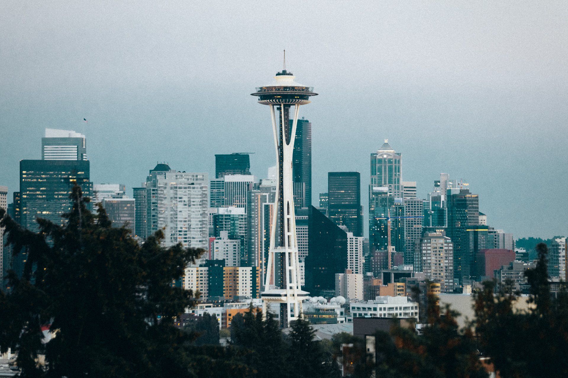 A city skyline with the space needle in the foreground