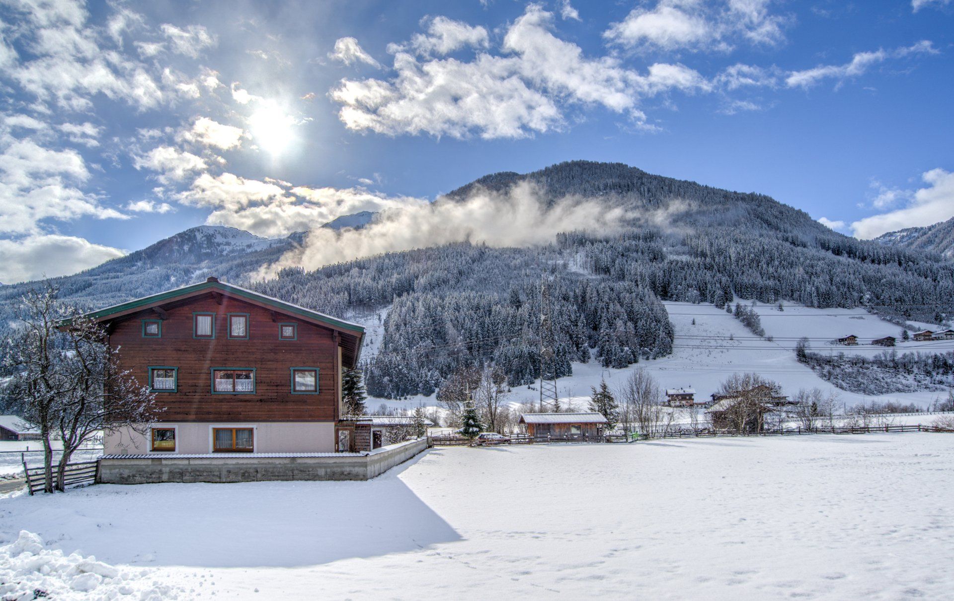 Snow landscape with chalet
