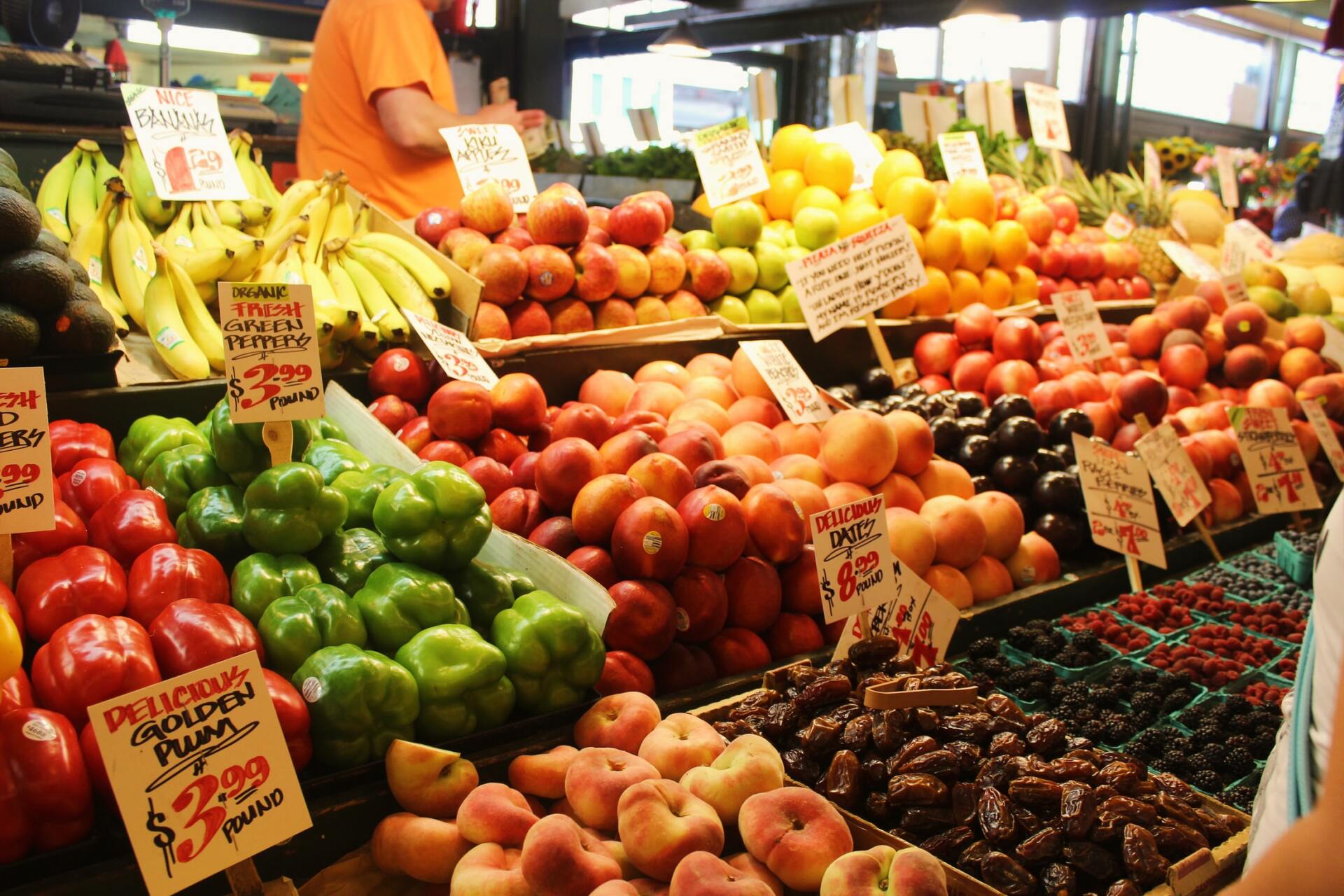 A variety of fruits and vegetables are for sale at a market