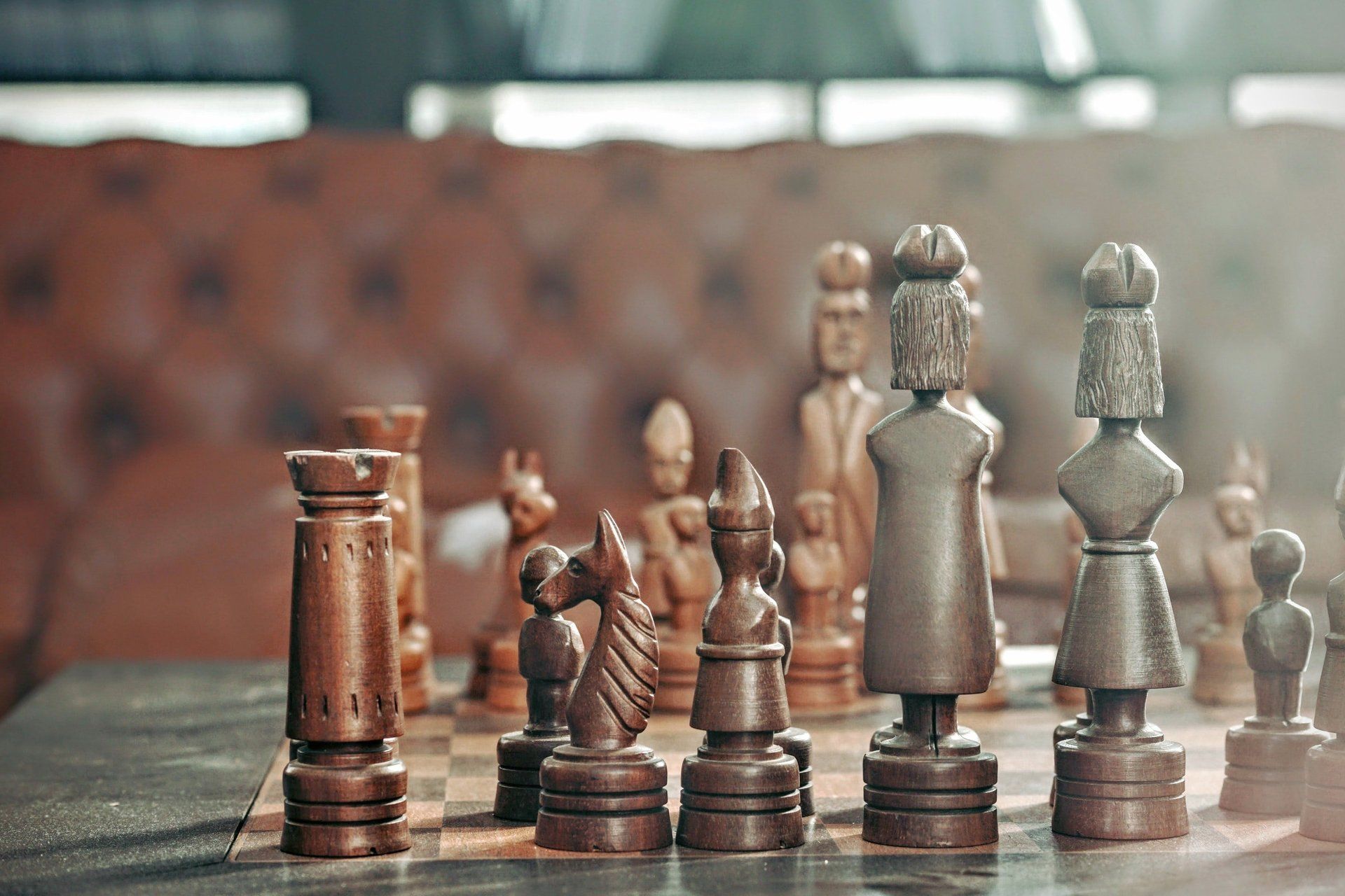 planning a strategy for franchising while looking at a chess board
