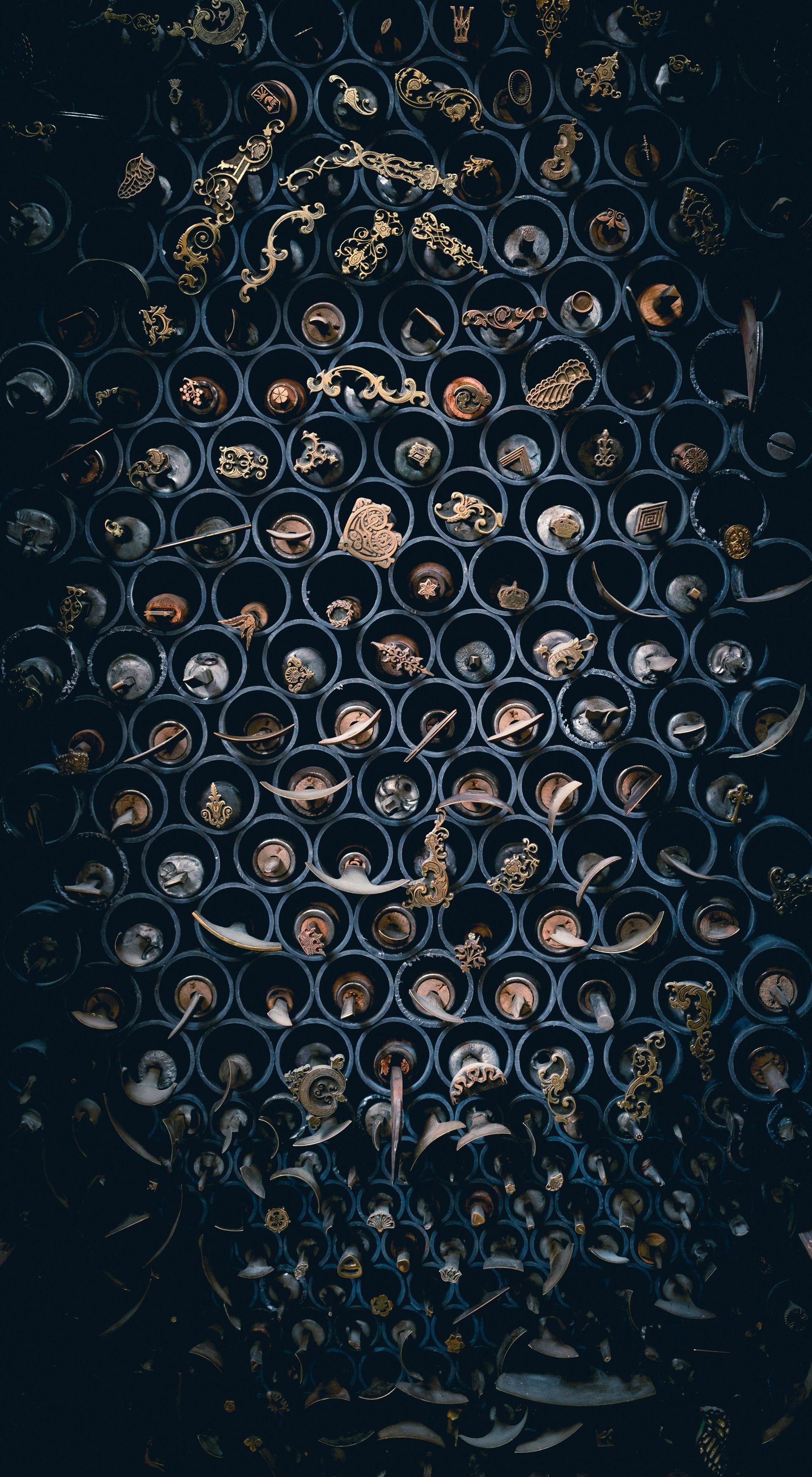 A close up of a honeycomb with flowers on it.