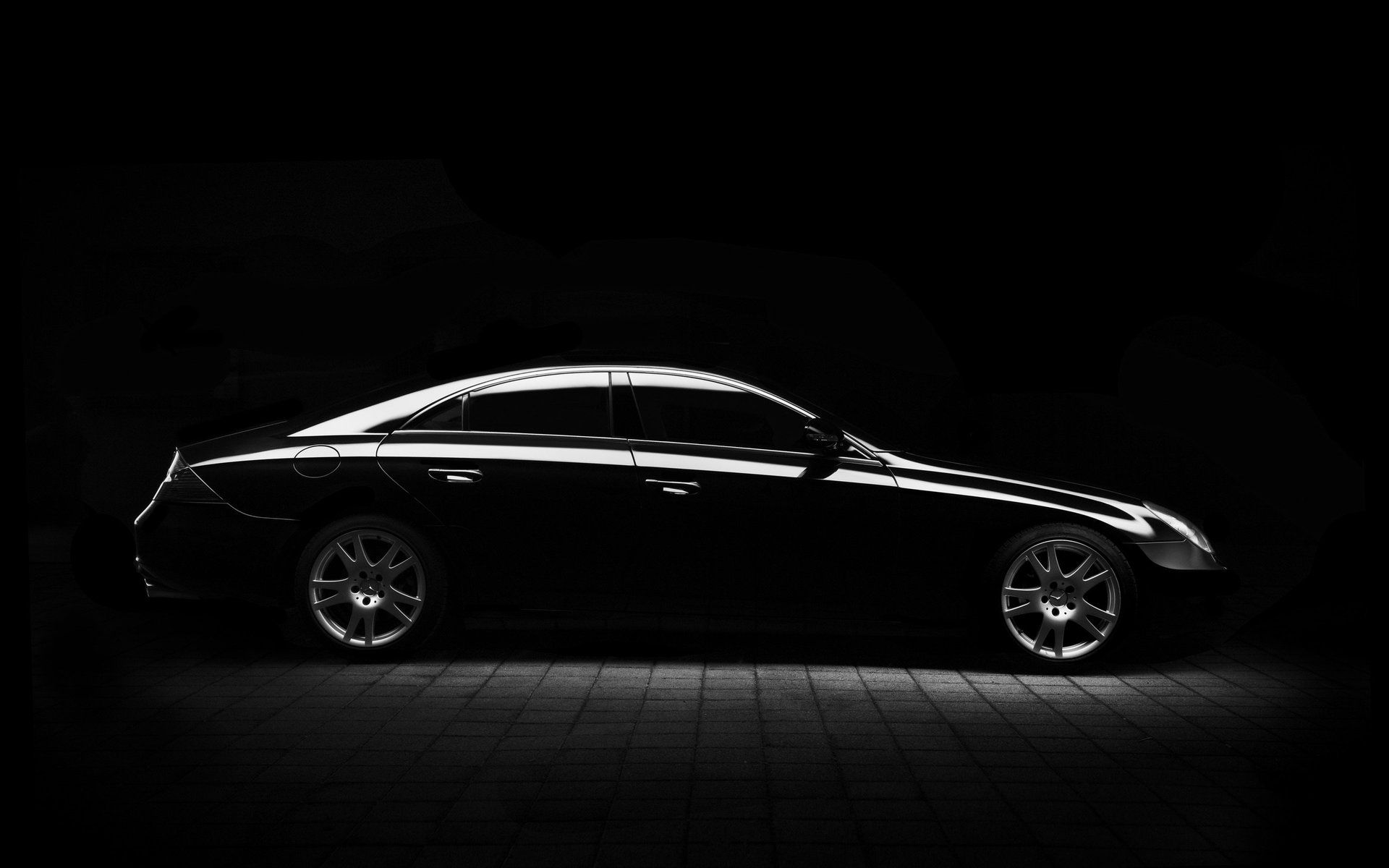 a black car in dem lighting .