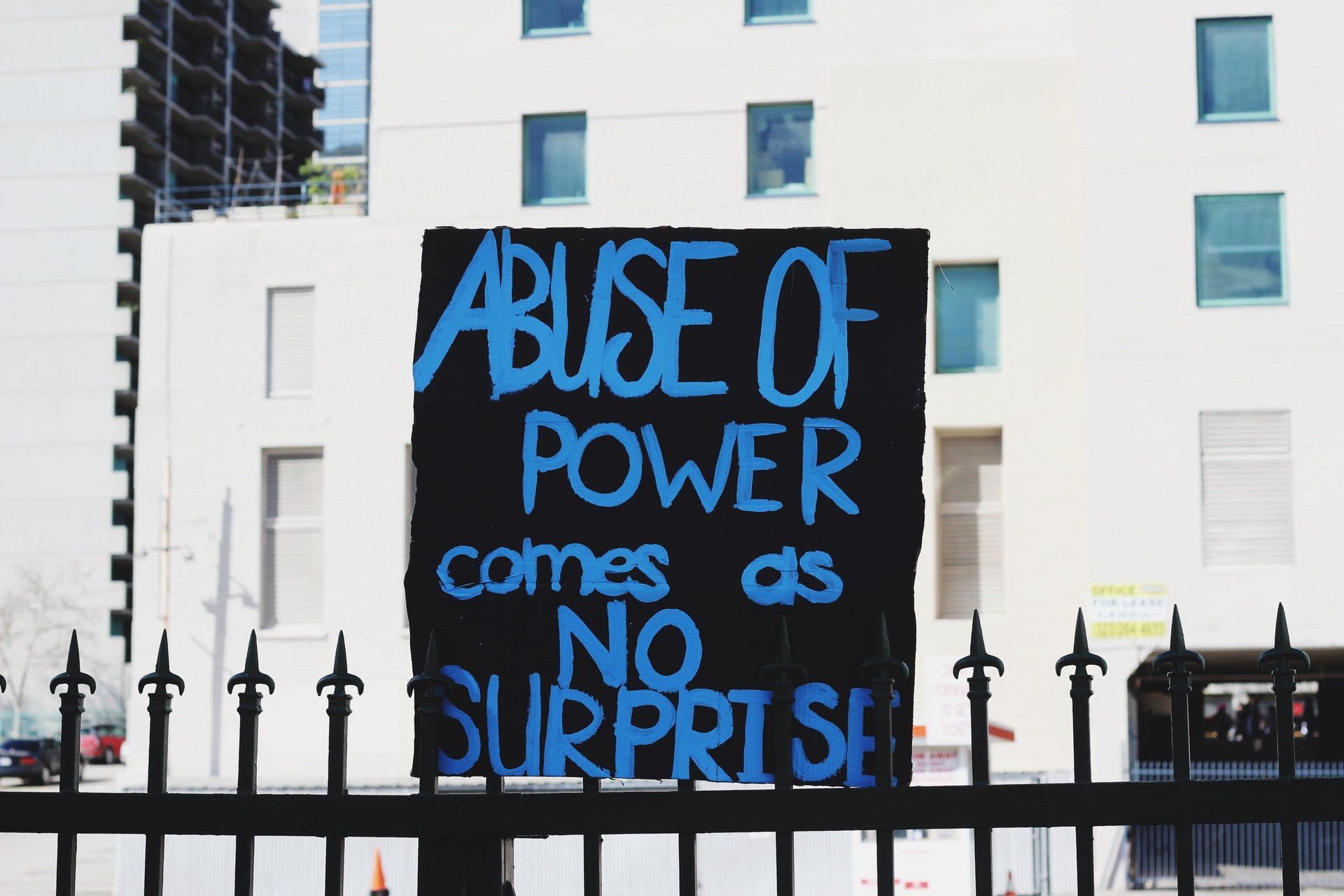 abuse of power sign