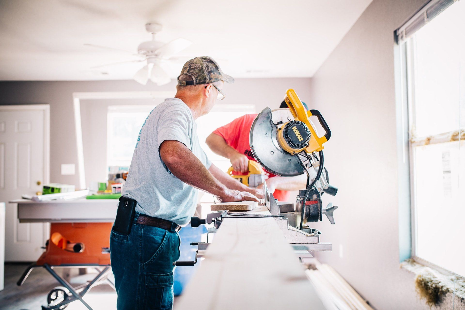 handyman working with a saw