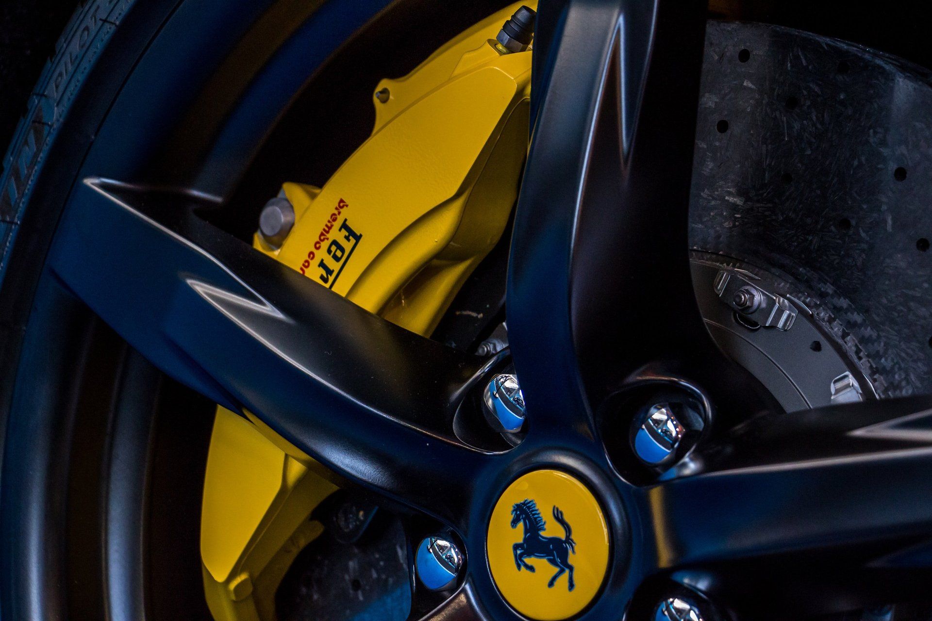 yellow Ferrari brake calliper