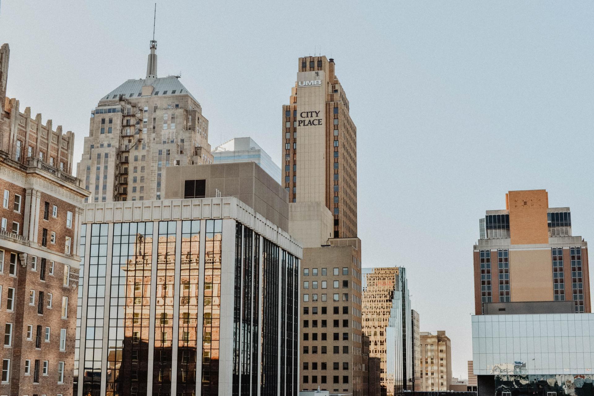 A city skyline with a clock tower in the middle