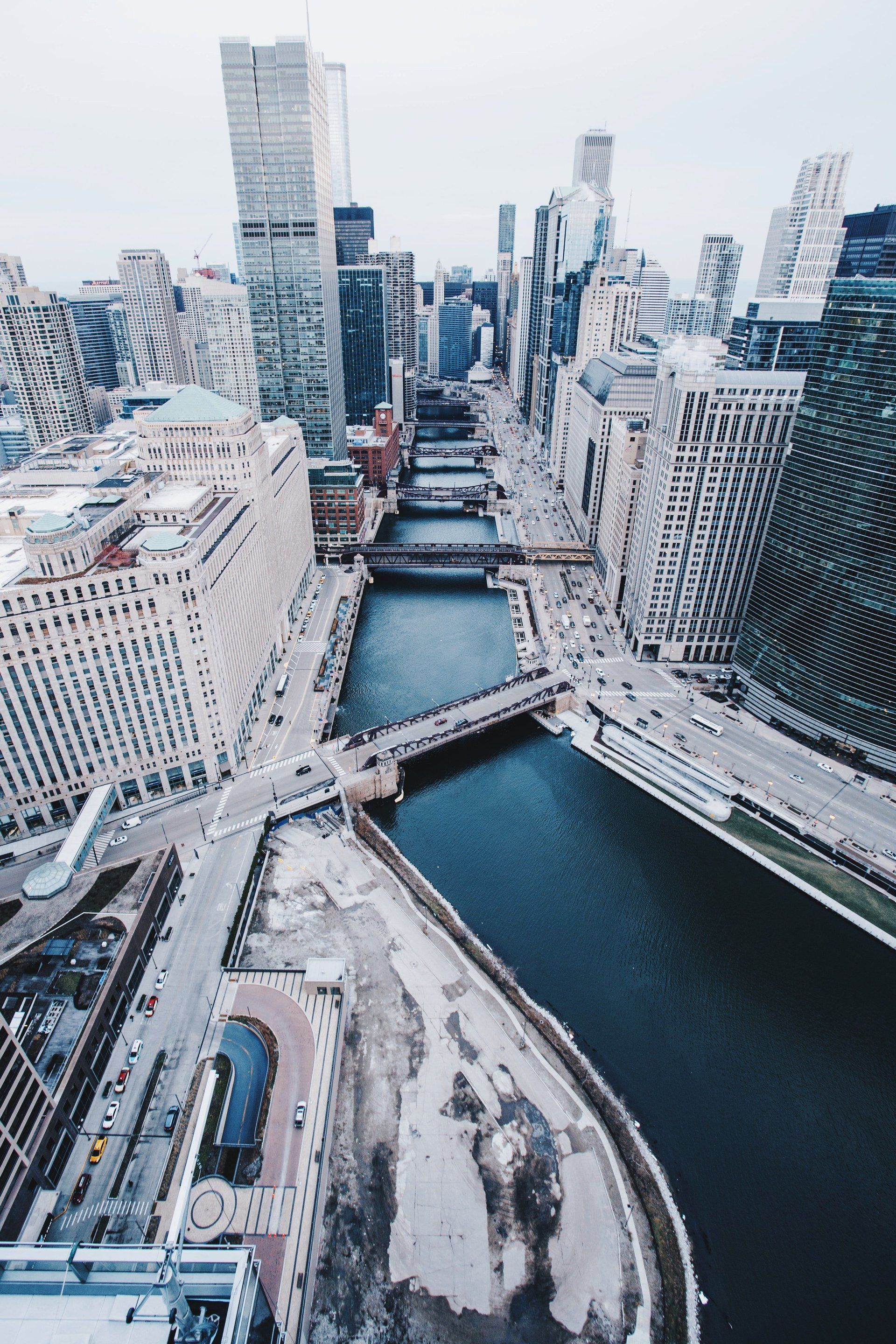 An aerial view of a city with a river running through it
