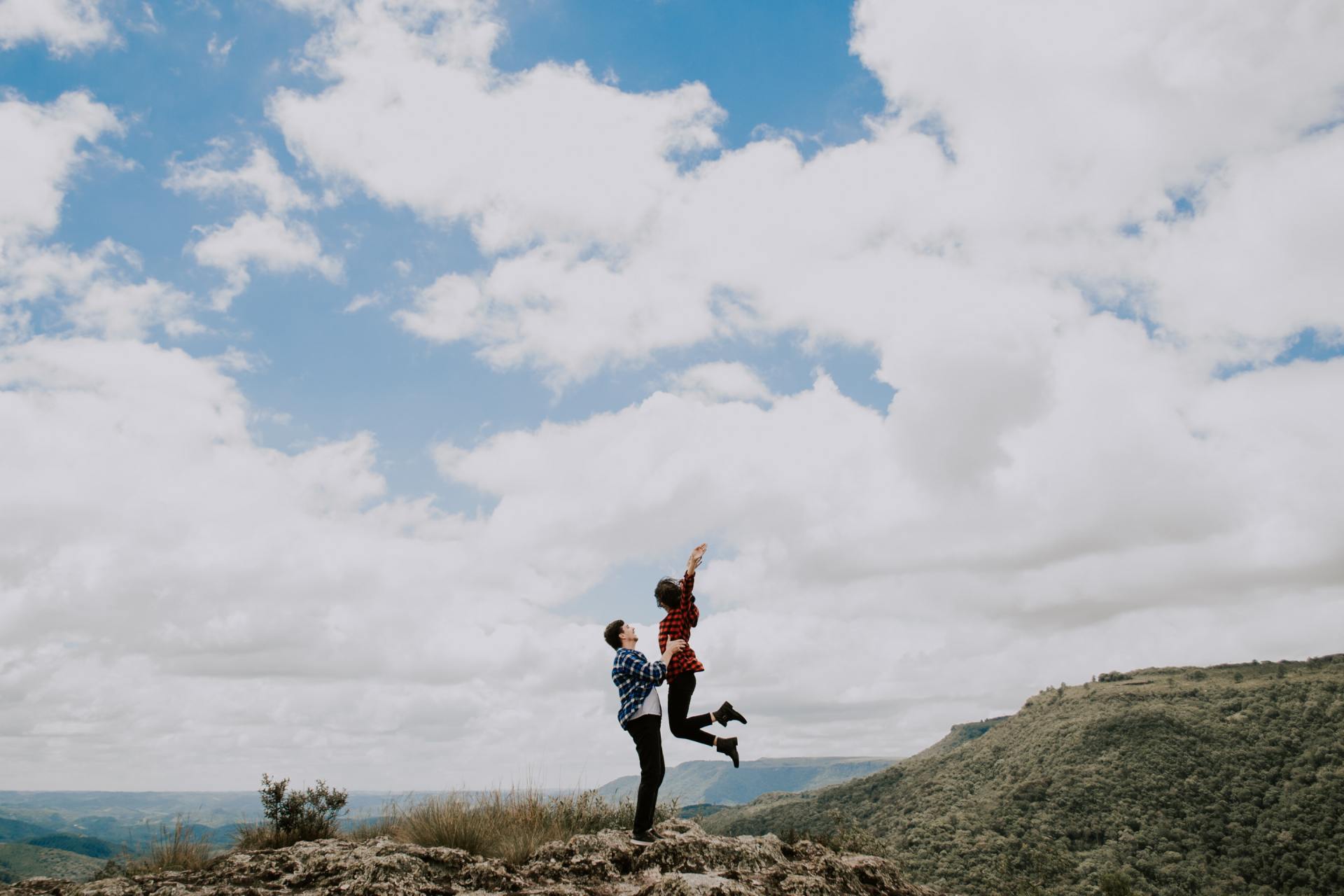 a couple jumping into one another's arms remind us of love